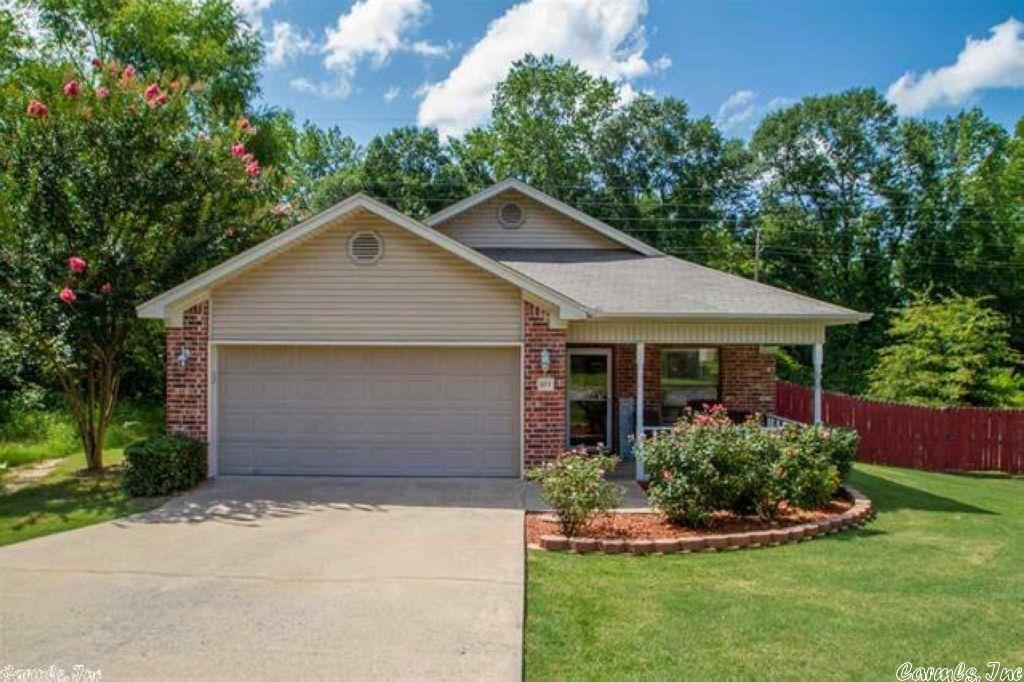 This cozy home is waiting to be yours. This 3 bedroom 2 bath home sits on a beautiful lot with a nice size backyard and has a darling front porch. This is a perfect home to start a family. Home features a split floor plan and has lovely concrete floors throughout the living room and kitchen. Nice size master bedroom and a added bonus is the beautiful white subway tile shower.
