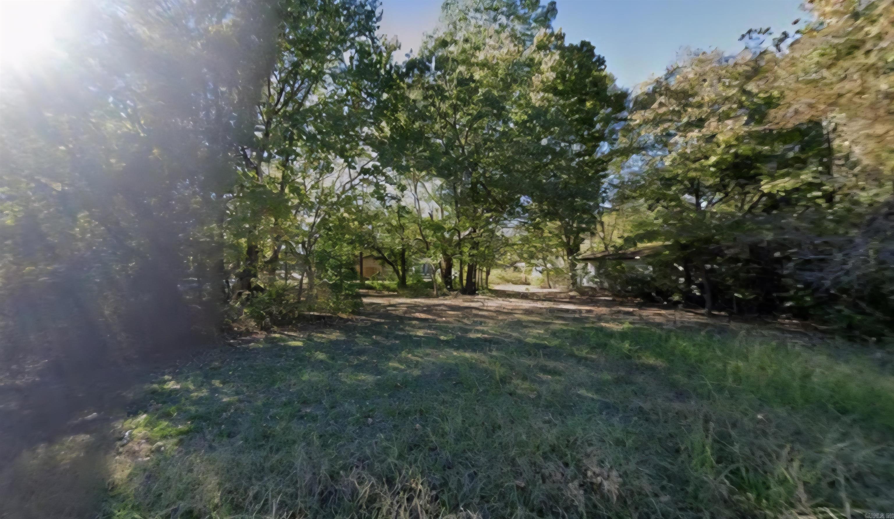Build a new home or place a manufactured home on this .30 (+/-) acre lot in Pine Bluff. It is flat and partially wooded and close to local amenities. Property conveys a Limited Warranty Deed. Owner financing is available. Call or text for more information.