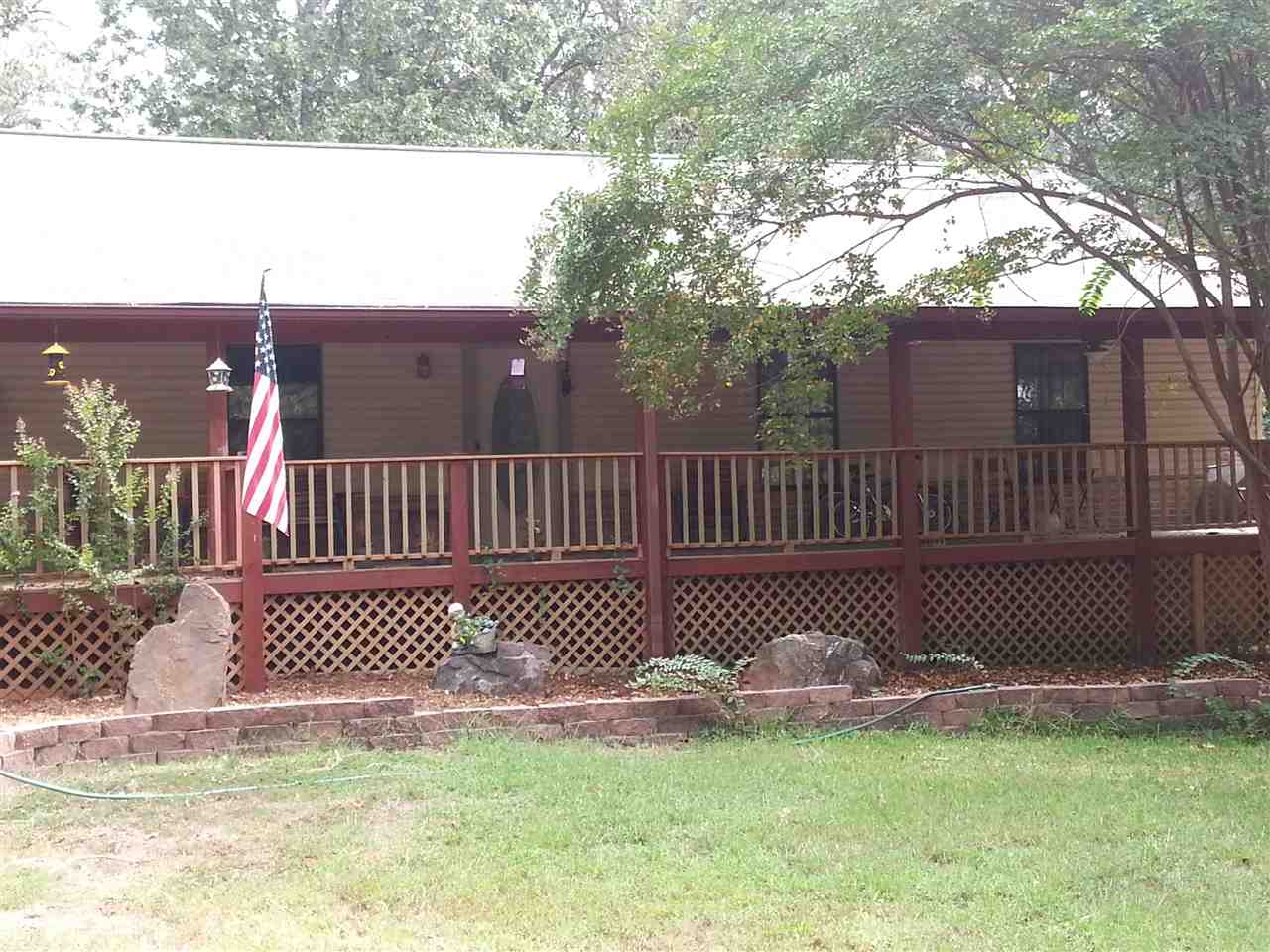 8.5 miles N of Mayflower is a 1820 Sq. Ft. house built in 1995.  3 bd, 2 ba on 5 acres. .  Home is handicap accessible, no stairs, wide doors, with a roll in master shower.  Large master suite with sunroom.  An office/den, which could easily be converted to a fourth bedroom.  Home is all electric with a propane fireplace.  Back up generator as well.  Large laundry room off the kitchen and an oversized two car garage.  Outbuildings for your animals and plenty of room for your hobbies.