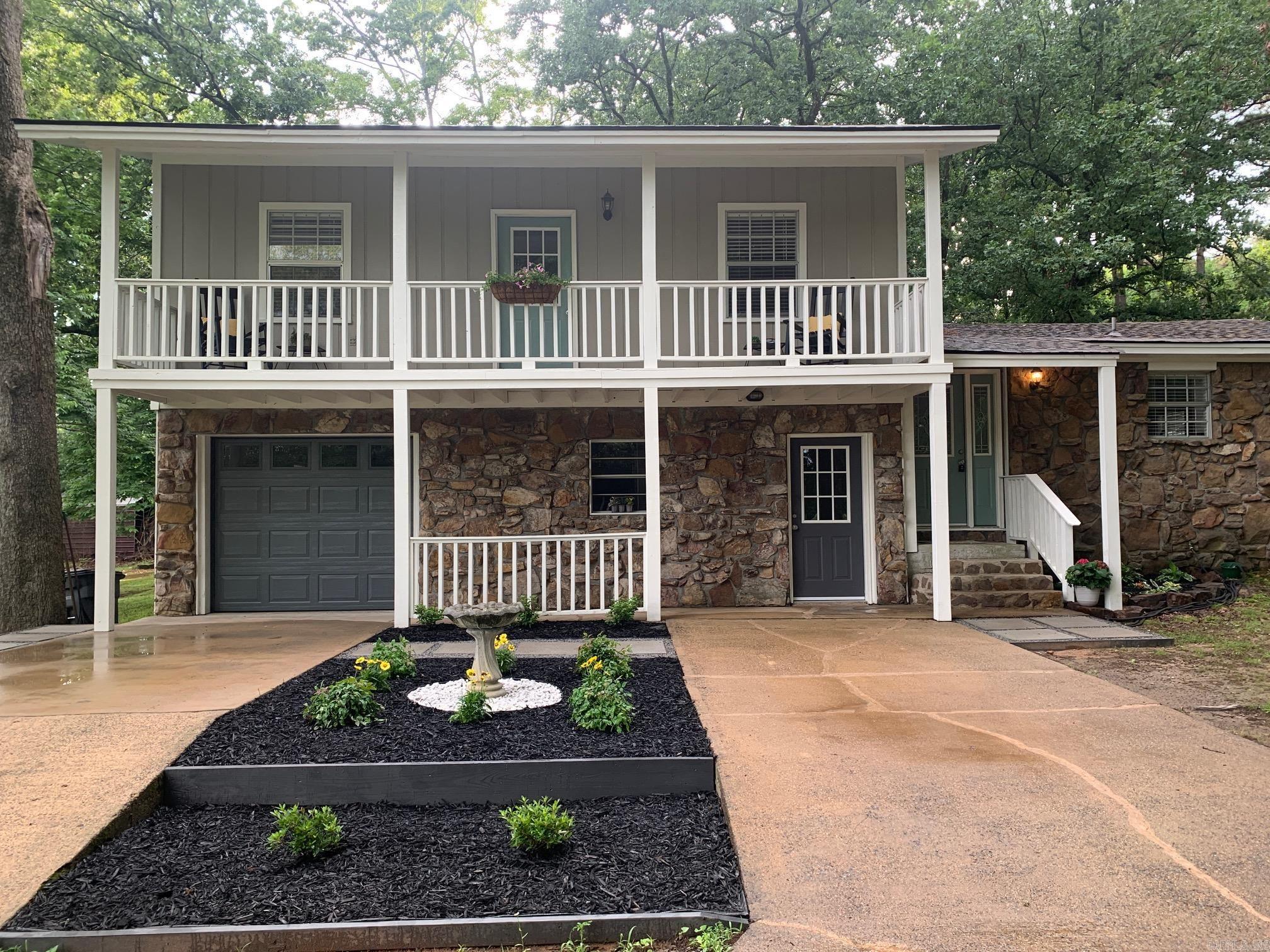 This beautifully updated tri-level home is full of charm, style, and modern improvements. From the moment you arrive, you will notice the fresh exterior paint and newly added landscaping that enhance the home's curb appeal. Inside, the home has extensively remodeled with fresh paint and flooring throughout - and absolutely no carpet in the home. Both bathrooms have been updated with new vanities, fixtures, and commodes, creating a clean and modern feel. The spacious upper balcony offers the perfect place to relax and unwind while the beautiful back deck is ideal for entertaining or enjoying quiet evenings outdoors. Additional upgrades include new ceiling fans throughout, a newly added Laundry Room and Office Space, plus added cabinetry in the Garage for extra storage and organization. This home truly offers so much more than can be listed here. Be sure to see the Improvements and Features Document for the full list of updates and extras. See Agent Remarks.