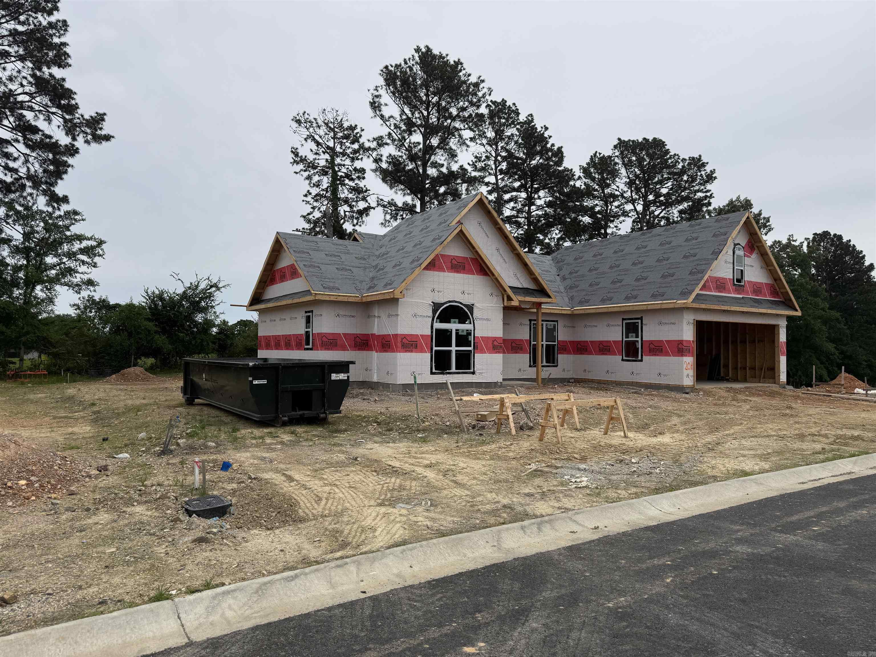UNDER CONSTRUCTION in the highly sought-after Lake Hamilton School District! This stunning 1,627-square-foot all-brick home in Walkway Point offers the perfect blend of quality, location, and modern efficiency. This thoughtfully designed single-story layout features three spacious bedrooms and two full baths, along with a versatile bonus room perfect for a home office or playroom. Built for long-term savings and comfort, this home includes energy-efficient appliances, a 95% high-efficiency furnace, and a tankless gas water heater. The heart of the home is a designer kitchen highlighted by a large granite island that flows seamlessly into the expansive great room, making it ideal for entertaining. You will find high-end finishes throughout, including durable laminate and tile flooring (no carpet), energy-efficient insulated windows, and a sleek all-brick exterior. Complete with a welcoming front porch and a level lot just minutes from Lake Hamilton, this brand-new build is a premier choice for