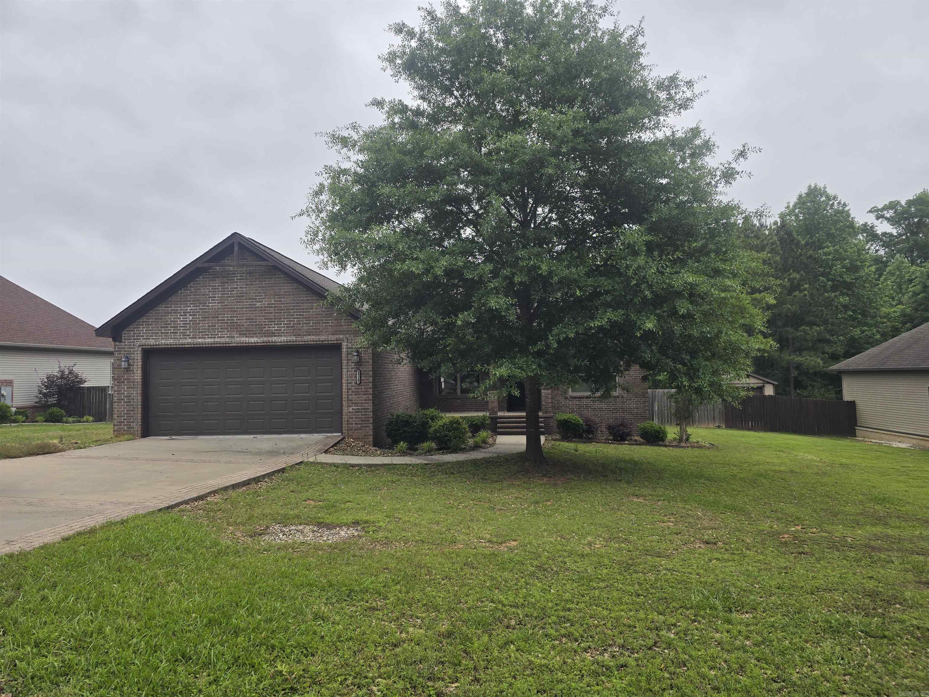 Well-maintained 3 bedroom, 2 bath brick home built in 2018, located in a quiet neighborhood in Sheridan. This property features a spacious living area centered around a fireplace. The kitchen offers granite countertops, ample cabinet space, and a practical layout for everyday living. Primary suite includes a private bath and good closet space. Additional highlights include a two-car garage and a fully fenced backyard, ideal for outdoor use. Move-in ready with modern finishes throughout.  AGENTS SEE REMARKS