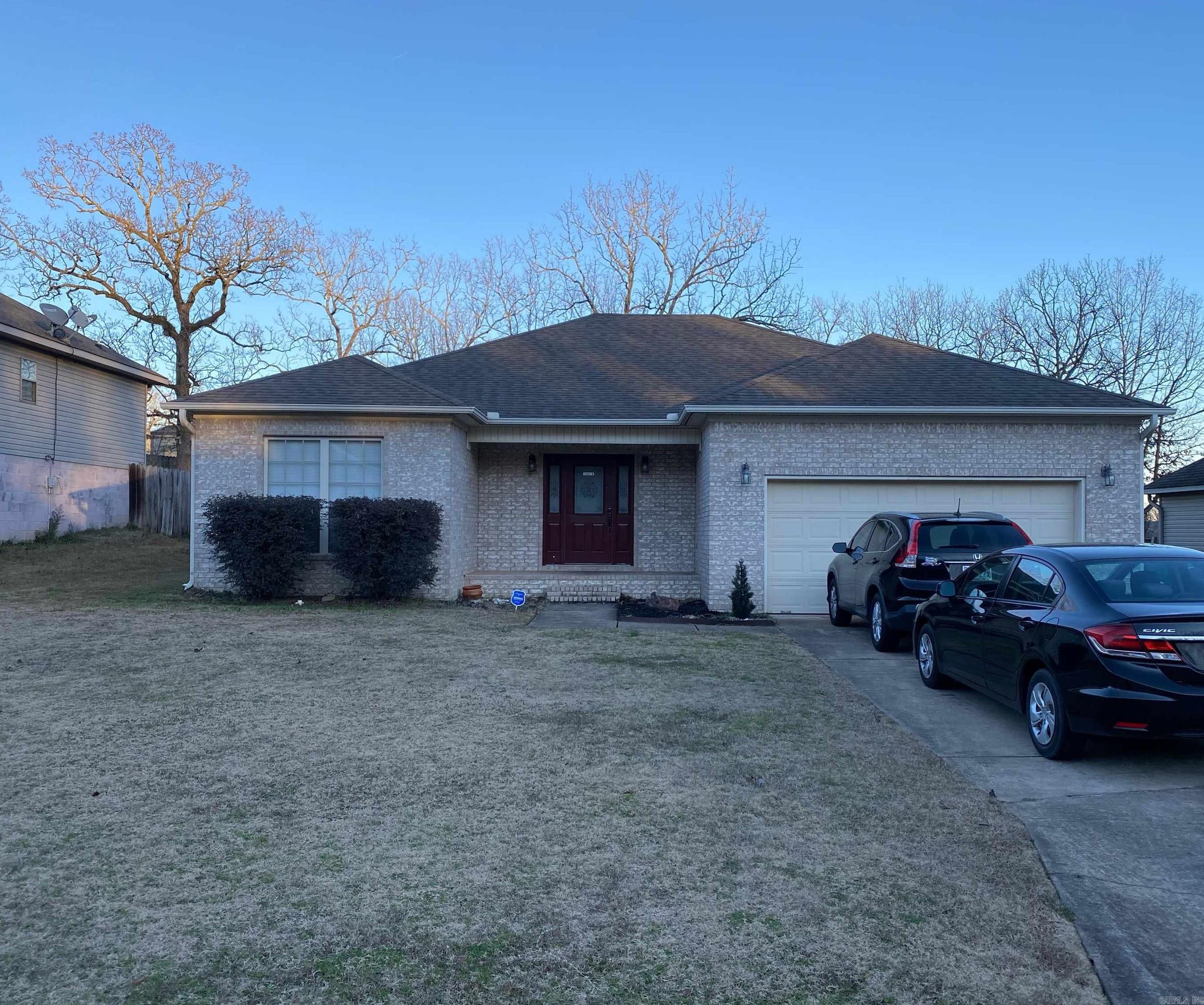 Built in 2003, this home includes wood and tile floors, a 2 car garage, and a fenced in backyard. Pets will be considered with a nonrefundable pet fee. Call (501) 860-5432 to schedule a viewing!