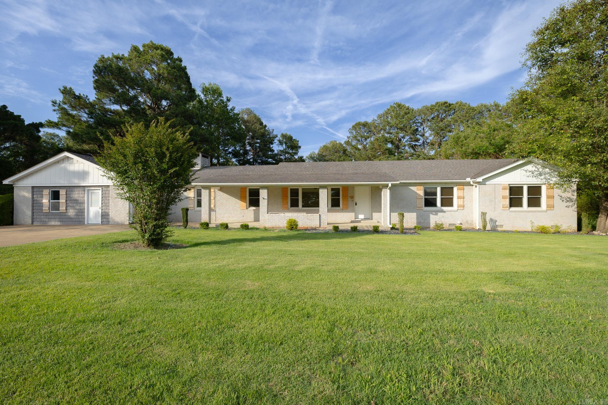 Discover the perfect blend of space, comfort, and functionality at 1287 W North Street in Piggott. Situated on approximately 2.46 acres, this well-maintained 5 bedroom, 3-bath home offers 3,374 square feet of living space designed for both everyday living and entertaining. The versatile floor plan features generous living areas and a bright sunroom ideal for enjoying views of the property year-round. The spacious kitchen and dining area provide plenty of room for gatherings and family meals. Outside, a large 49' x 24' shop offers excellent space for storage, projects, equipment, or a home-based business. The expansive acreage provides room for gardening, recreation, or future improvements while still being conveniently located near schools, shopping, and local amenities. This unique property combines the benefits of country-style living with the convenience of town, making it a rare opportunity in Piggott.
