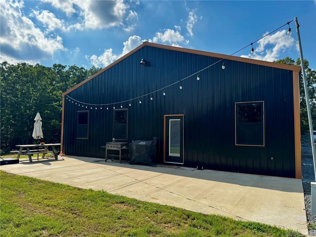 Welcome to 100 Odom Point Road in Bee Branch, AR! Set on 10 beautiful acres, this newly built barndominium offers the space and flexibility you've been looking for. With 2,400 sqft of living area and 1,600 sqft of heated and cooled shop space, you'll enjoy 4,000 sqft under roof. The modern and bright open-concept design features 4 bedrooms, 2 bathrooms, a spacious living and entertaining area, LVP flooring, LED lighting throughout, and closed cell spray foam insulation for energy efficiency. Additional highlights include an RV hookup and pump out connection, making it easy to accommodate guests or your next adventure. Whether you're looking for a place to pursue hobbies, store your toys, or simply enjoy the peace and privacy of acreage living, this property is equipped to handle it all. Conveniently located just 17 miles from Greenbrier and 15 minutes from Greers Ferry Lake, you'll have easy access to shopping, dining, outdoor recreation, and lake activities while enjoying the tranquility of rural Arkansas.
