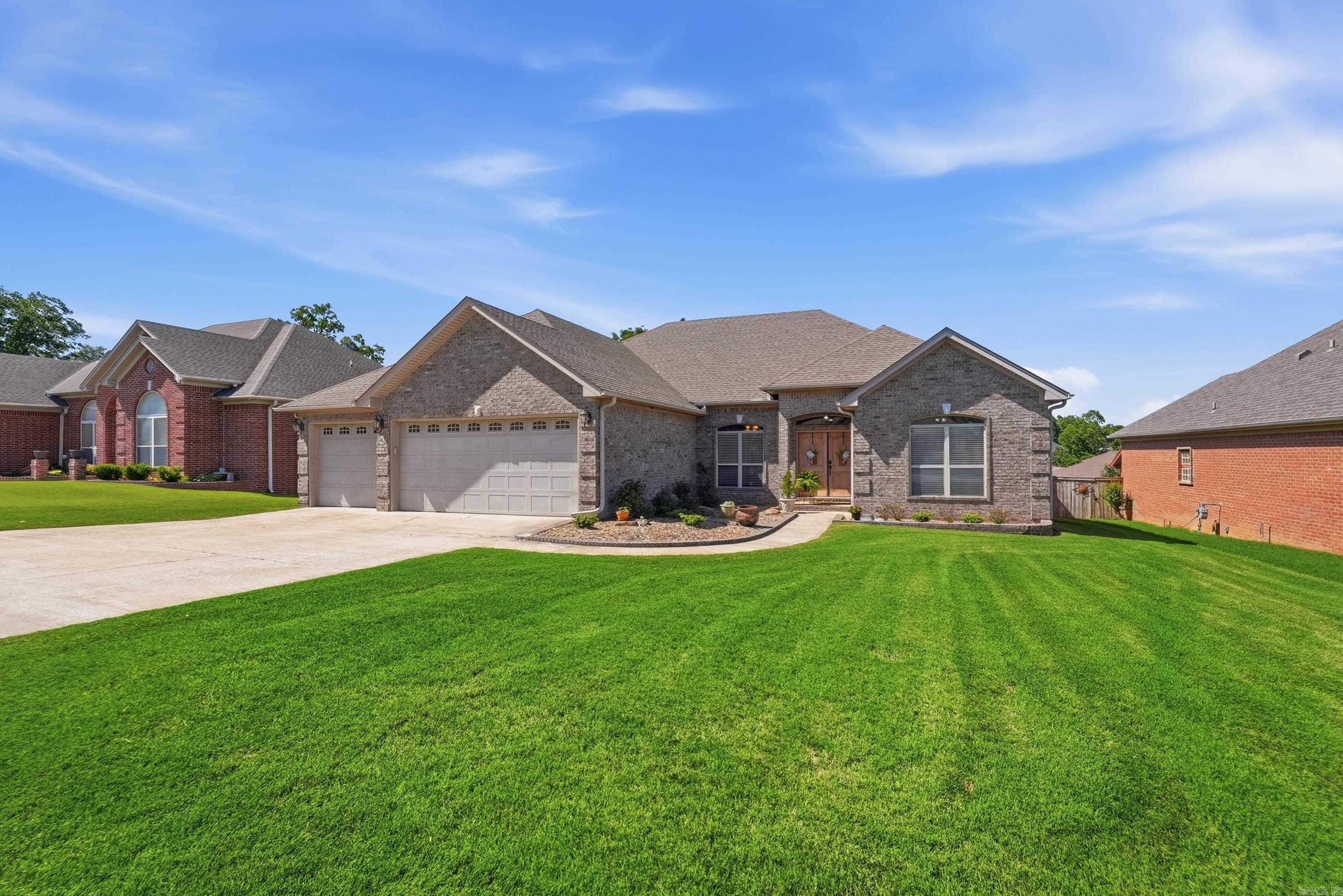 Welcome to 9500 Journey Drive where “Any Way You Want It” might just describe the perfect place to call home. This thoughtfully designed 4-bedroom, 2.5-bath home offers an excellent split floor plan with a private primary suite tucked away from the additional bedrooms. The spacious primary retreat features its own back patio access and an oversized walk-in closet with exceptional storage capacity. Every detail in this home was carefully considered, with abundant storage throughout and beautiful custom stained-glass transoms that add character and timeless charm. The kitchen and living areas flow seamlessly for both everyday living and entertaining, while the backyard is ready for relaxing evenings around the stunning outdoor fireplace just off the covered patio. Need space for hobbies, storage, or your bass boat? The massive 3-car garage/workshop offers room for it all. Additional updates include a brand new back fence for added privacy and peace of mind. Located in a desirable area with space, function, and personality, this home is ready to fit your lifestyle any way you want it.