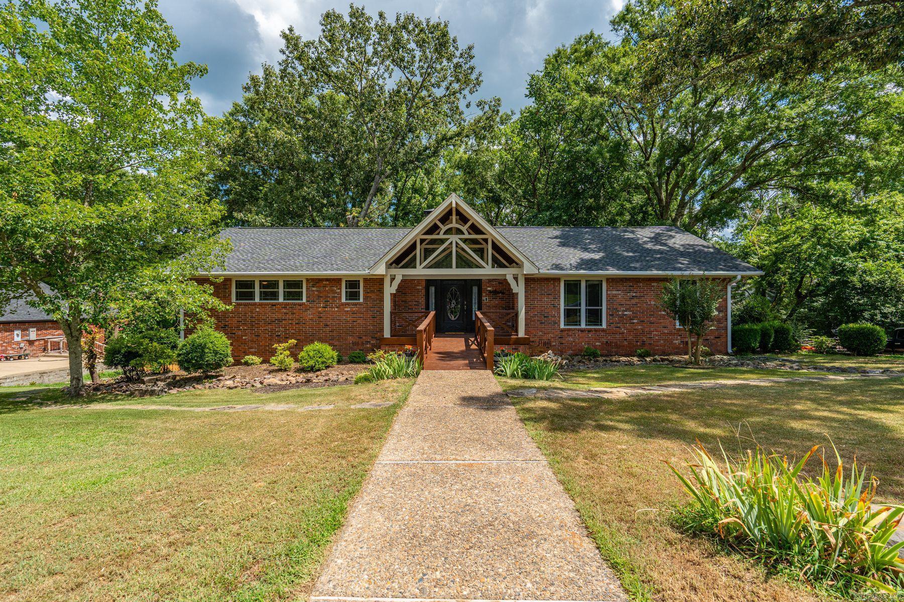 Beautifully updated Craftsman-style home in the highly sought-after Eastgate II subdivision! Soaring vaulted ceilings with exposed beams and new double-hung windows fill the home with natural light while showcasing the lush backyard and picturesque neighborhood setting. The thoughtfully designed floor plan offers true main-level living, with the added flexibility of a private lower-level featuring a 2-bedroom in-law suite complete with its own living room, fireplace, and patio—ideal for guests, multi-generational living, or extended stays. Upgrades include a new roof, new HVAC, quartz countertops, beautifully renovated bathrooms, and two inviting fireplaces. A complete list of improvements is available upon request. Located in one of the most desirable neighborhoods in the Lakeside School District, this home offers the perfect combination of character, comfort, and modern updates. Schedule your private tour to truly appreciate everything this exceptional property has to offer.