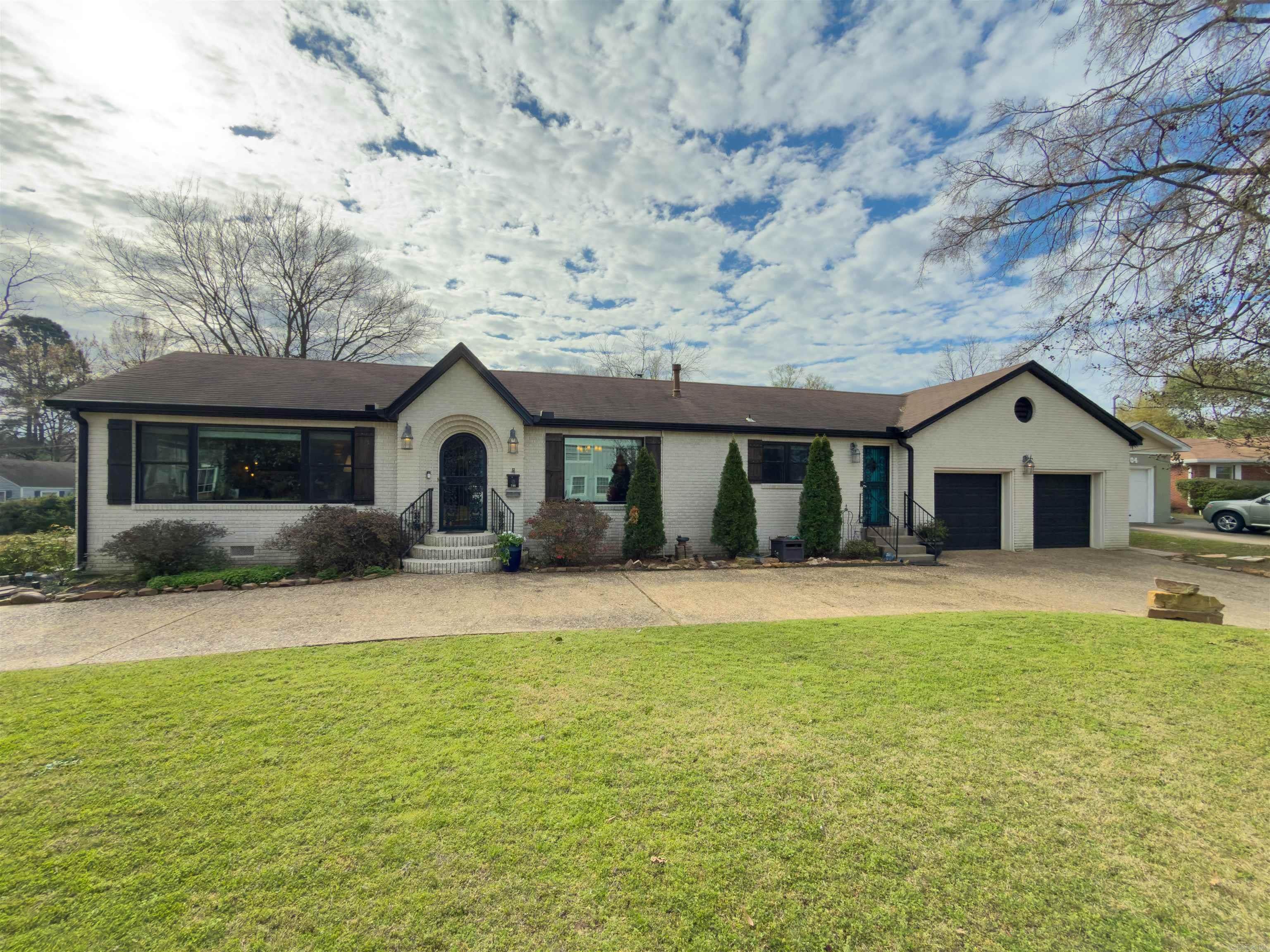 PARK HILL JEWEL! This home offers everything a family that loves to entertain needs.  The kitchen is a Chef's dream. Large Living Room, Dining Room, and Den with a coffee bar w/ a cooktop and fireplace. Four spacious bedrooms on one level.  All bathrooms updated.  The in-law suite is perfect for Mom, teens, an income suite, or an office. The spacious fenced back yard has a covered patio and an air-conditioned workshop.  Large concrete slab for the outdoor kitchen.  Must see this ONE.  OPEN HOUSE SUNDAY 05-17-2026