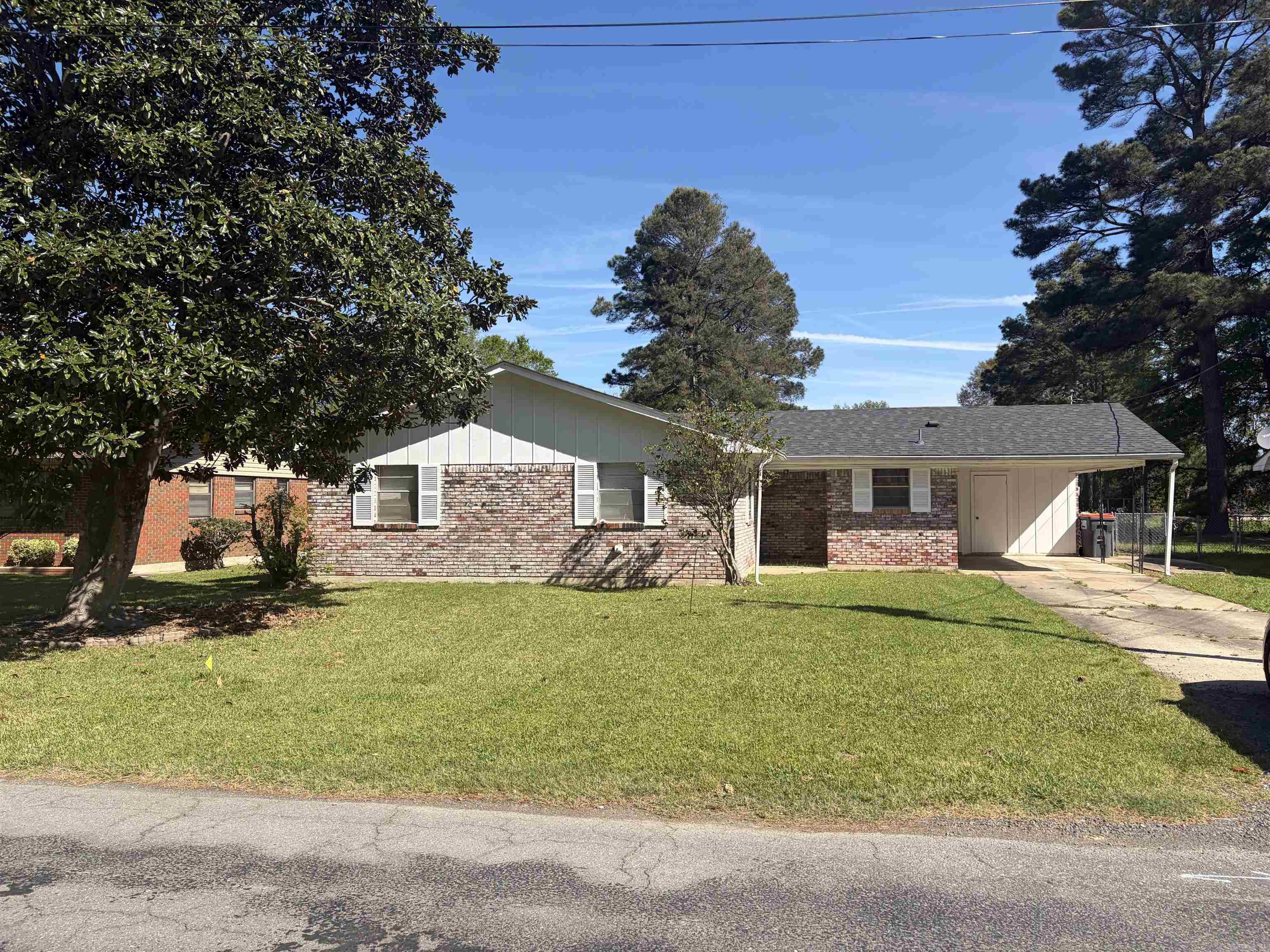 This is the charming starter home for the new owners. The home is centrally located to everything in the city. The medical facilities are in close proximity. The shopping and restaurants are located within 15 minutes. The entertainment and educational services are very conveniently located, such as, SEARK, UAPB, Charter and Public Schools. The home has a nice open floor plan suitable for comfortable living. The large backyard is waiting for the new family pet. The bedrooms are ready for the special decorating touches of the new owners. The carport is wonderful for unloading of groceries, during the rainy season. Please schedule your appointment today, to start your next chapter of life!!