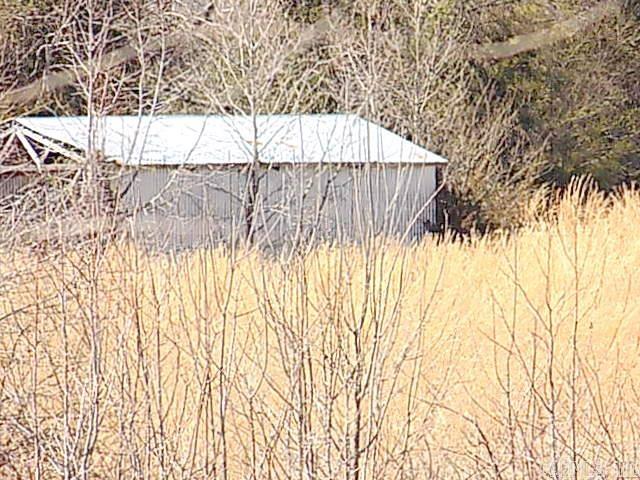 paved street with curb and gutter 10 acres ready to subdivide or have a large home.  No minerals convey.  City water,City sewer and natural gas available.