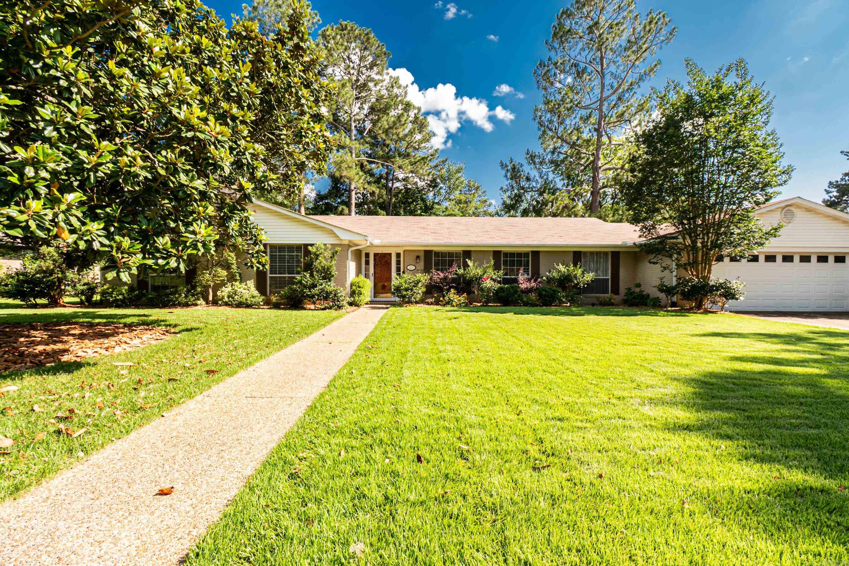Located on the highly desirable west side of town, this charming 4-bedroom, 2.5-bath home offers the perfect blend of comfort, updates, and outdoor living. The beautifully remodeled kitchen and completely updated primary bath provide modern finishes and functionality, while the spacious layout offers room for the whole family.  Step outside to enjoy the screened-in porch, an ideal spot for relaxing or entertaining. The newly fenced backyard features raised garden beds, a peaceful koi pond, and plenty of space for outdoor activities. A storage building provides additional room for tools, equipment, or hobbies.  With its thoughtful updates, inviting outdoor spaces, and sought-after location, this home is one you won't want to miss.