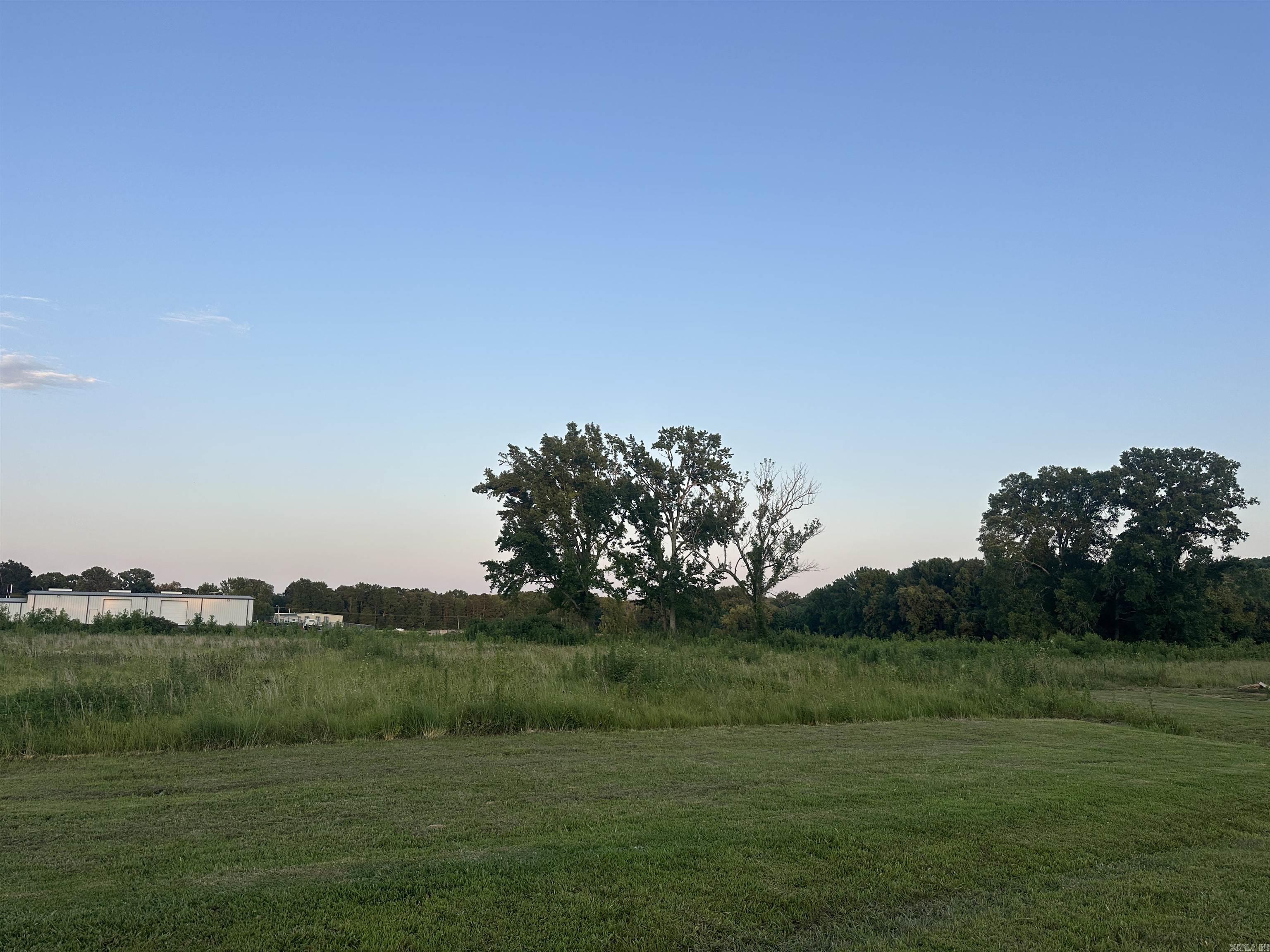Come join the quickly growing area of Beaverfork! Conveniently located to HWY 65. Located next door to the beautiful new RV park and Cornhole Golf. This is the perfect opportunity for a new or expanding business to bring their ideas! The lot is level with approximately 4.11 acres.