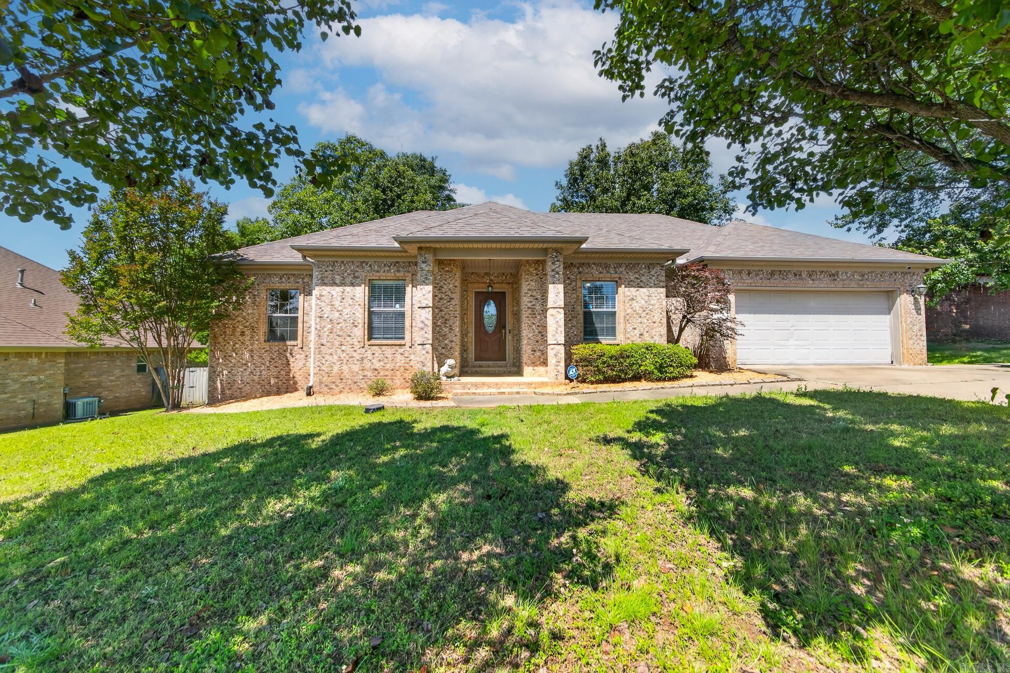 Discover this beautiful 4 bedroom, 2 bathroom home located in the highly sought after Magness Creek North subdivision! The neighborhood POA offers wonderful amenities including a picnic area, playground, and tennis courts, creating the perfect community atmosphere. This home boasts fantastic curb appeal and a large fenced backyard designed for exceptional outdoor living and entertaining. Step inside to a warm and inviting living room featuring beautiful wood flooring and a cozy gas log fireplace. The kitchen offers abundant cabinet space, a large pantry, and a separate dining area perfect for gatherings and everyday living. The spacious primary suite features a large walk in closet and a private ensuite bathroom complete with double sink vanity, walk in shower, and relaxing jetted tub. Additional bedrooms are comfortably sized with carpet flooring for added warmth and comfort. Freshly painted and featuring a NEW water heater, this well maintained home is move in ready and waiting for its next owners!  Call today to set up a private showing!