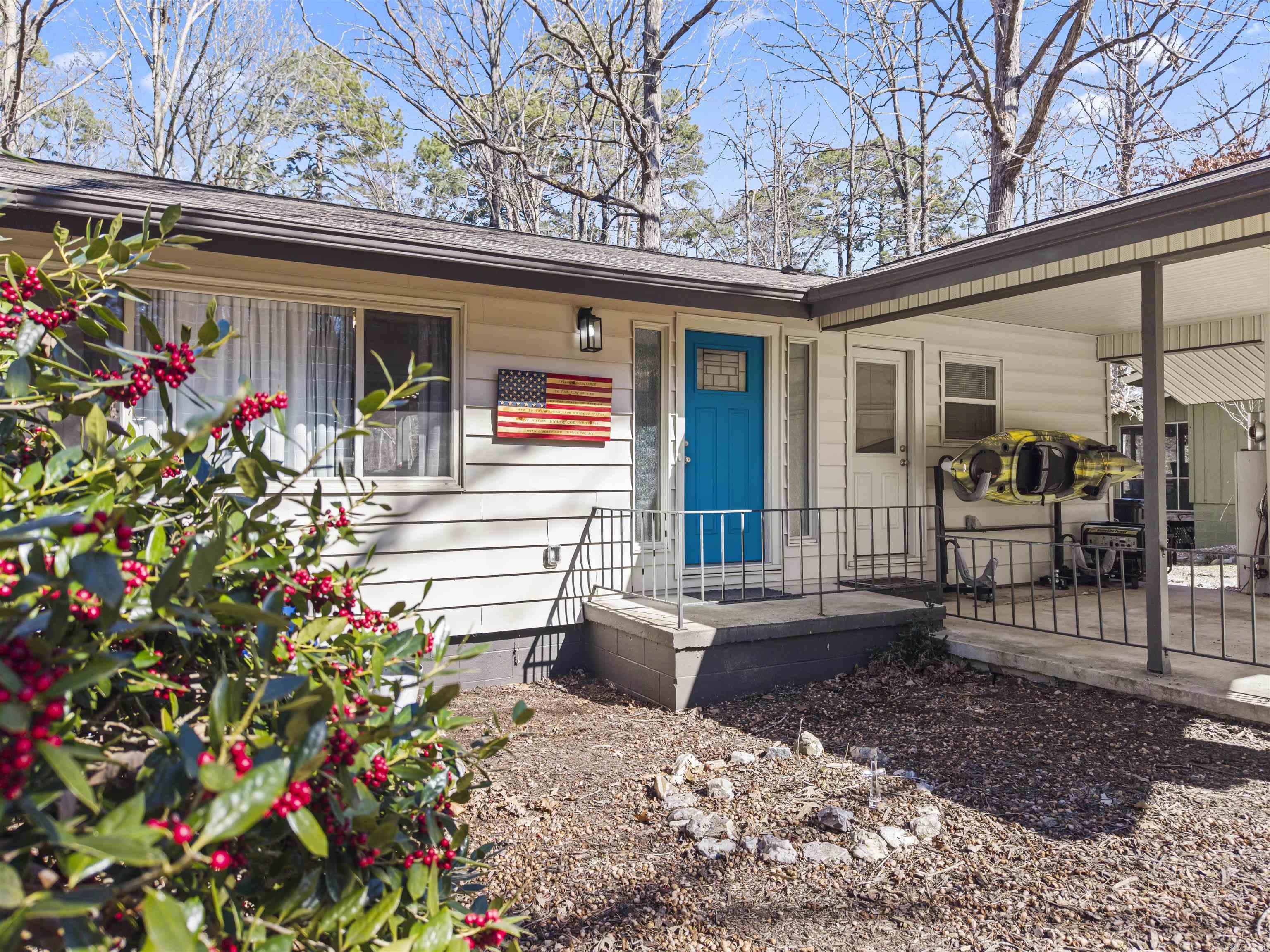 ONLY $199,500!!  SELLING FURNISHED WITH ALL APPLIANCES!  1 YEAR HOME WARRANTY PAID BY SELLER!! COMPLETELY REMODELED 2 BED 2 BATH HOME- UTILIZE IT AS AN AIRBNB/VRBO, AS YOUR VACATION HOME, OR AS A CHARMING PLACE TO CALL HOME YEAR ROUND! THE LEVEL DRIVEWAY WITH ROOMY CARPORT IS AN ADDED CONVENIENCE THAT YOU'RE SURE TO APPRECIATE! THIS HOME ALSO HAS A FULL LAUNDRY ROOM WITH AN ENTRANCE RIGHT OFF OF THE CARPORT AND A DETACHED STORAGE BUILDING! DO NOT OVERLOOK THE COVERED DECK WITH A BEAUTIFUL A WOODED VIEW TO ENJOY NATIVE WILDLIFE OR THE 8FT CEILING CRAWLSPACE WITH AMPLE ROOM FOR A WORKSHOP OR STORAGE! THIS ONE WILL NOT LAST AT THIS PRICE! CALL ME TO SCHEDULE YOUR SHOWING! *New Wiring-New Plumbing-New floors-New soft-close cabinetry-New HVAC- New appliances-New Roof-New paint AND MORE!