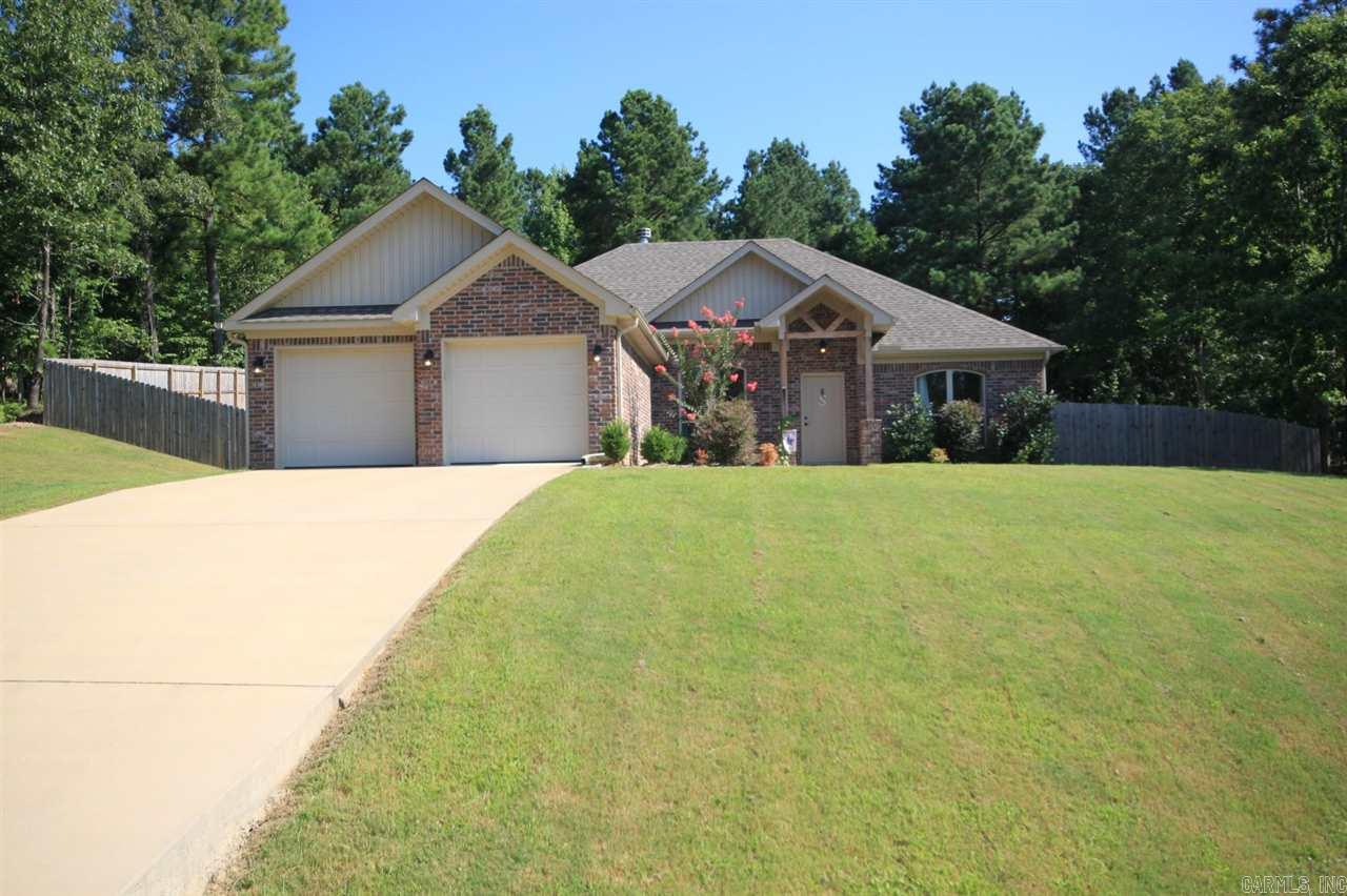 Gorgeous newer construction on almost an acre in a very desirable subdivision. Living area has 10' ceilings, W/FP, hardwood floors and is open to kitchen/dining. Kitchen has custom cabinets, granite counter tops and stainless steel appliances. Ceramic tile in all wet areas and crown molding in all rooms. Home has a split bedroom floor plan with master having tray ceiling. Master bath has a separate shower, soaker tub and a walk-in closet. Backyard is fenced but the property goes beyond the fenced area.