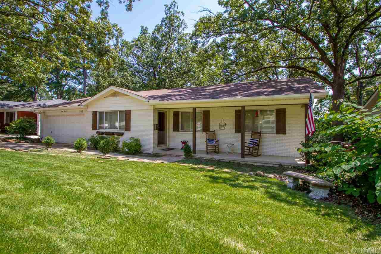 This beautiful one level, all brick home has new exterior and interior paint, new hardwoods that blend beautifully with refinished hardwoods, kitchen with double ovens, huge laundry/utility/craft room, 2 car garage, large fenced back yard with newer deck, H/A installed in 2014, roof replaced in 2010, and new gutters!