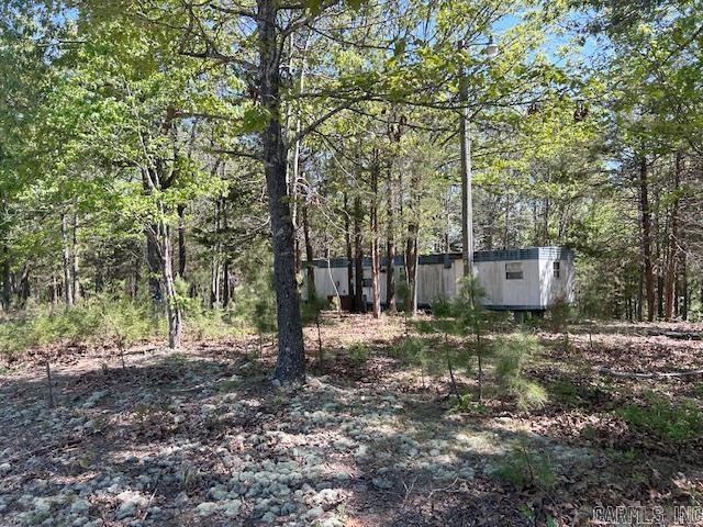 8.5 ACRES/UTILITIES ON-SITE/MINUTES TO THE BUFFALO RIVER Looking for a secluded spot that isn't off the grid. This gorgeous property features power and water already connected. Located between Yellville and Mountain Home.  Great place to build your forever home or just a getaway or hunting cabin. Property is unrestricted and has an abundance of deer and turkey, great for that hunter in your life. An older mobile home is on the property and could possibly be fixed up.  Must see to appreciate the beautiful piece of property.