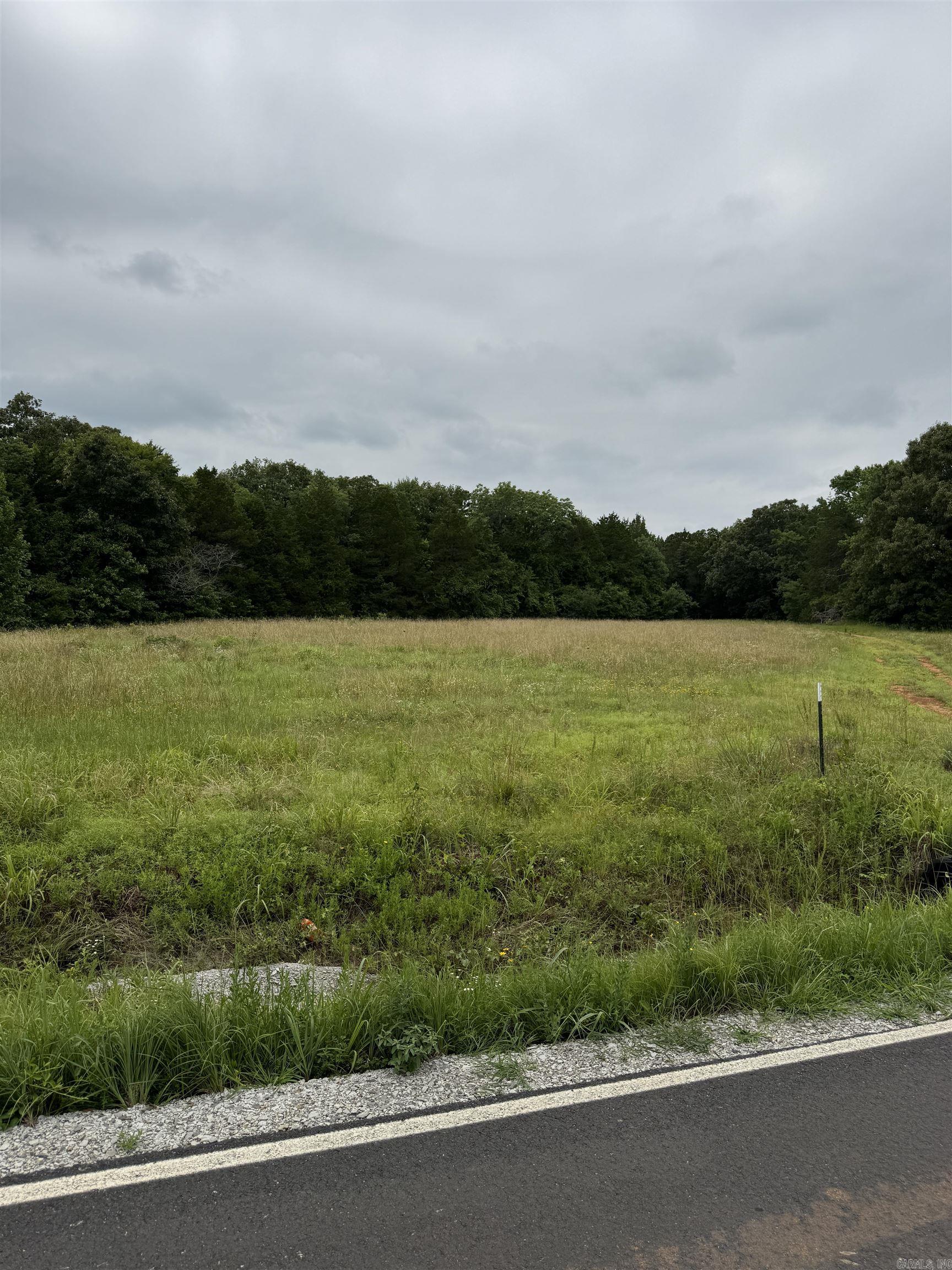 Discover your own slice of Arkansas countryside with this beautiful 40-acre property located just 15 minutes from Searcy. Offering the perfect balance of privacy, accessibility, and natural beauty, this tract is an exceptional opportunity for those seeking a private hunting retreat, a custom home site, weekend camping getaways, or a long-term investment in land. Approximately 85% of the acreage is in mature timber, providing excellent wildlife habitat, natural seclusion, and valuable timber resources. The remaining 15% is cleared and ready for immediate use—ideal for building a dream home, establishing food plots, or setting up a campsite. A established road leads into the property, making it easy to access and develop. Utilities are available at the road, simplifying the path to your future build or improvements. This versatile parcel sits in a desirable area of White County, known for its rolling terrain, abundant wildlife, and peaceful rural lifestyle. Whether you're an outdoor enthusiast looking for prime hunting land, a family ready to create a private homestead, or an investor seeking recreational or residential development potential, this property delivers outstanding value.