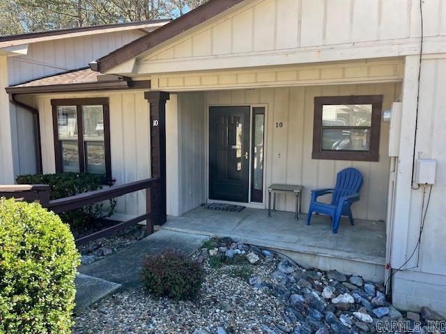 Beautiful move-in ready townhome just needing your own personal touches.   This 2 bdrm, 1.5 bath unit is conveniently located near the West Gate and many amenities. It is just off the beaten path, quiet and peaceful and nature loving.  There is an extra refrigerator on the deck for drinks and such, so spending time outside is easy to do. Great as a full time live in, or a weekend get away, please take the time to check it out. You won't be disappointed! Washer and Dryer do not convey.  Property being sold "as is".   Agents see agent remarks.....