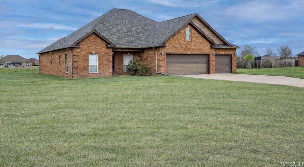 Welcome to Ashley Downs, a gated community in Scott, Arkansas! Situated on approximately 1.6 acres, this beautifully maintained 4-bedroom, 3-bath home offers 2,657 square feet of comfortable living space with an open floor plan designed for both everyday living and entertaining. Features include a spacious living area, breakfast bar, bonus room, oversized 3-car garage, gas logs, tray ceilings, sprinkler system, and a well-appointed kitchen with double ovens, built-in stove, microwave, dishwasher, refrigerator, and ice maker connection. A whole-house generator adds extra convenience and peace of mind.  Built in 2012, this home combines quality construction with thoughtful updates, including a new roof (2021) and HVAC system (2022). Flooring includes luxury vinyl, tile, and laminate throughout. Residents enjoy gated access, proximity to Horseshoe Lake, and a peaceful country-style setting while still being conveniently located near Little Rock and North Little Rock.  Some photos have been virtually, or AI staged to showcase the home’s design potential and furnishing possibilities. Furnishings shown in staged images are not included with the property. See agent remarks for gate code.