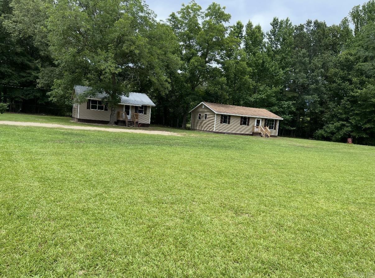 NEWLY RENOVATED HOMES ONE 2 BEDROOM ONE BATH AND ONE 3 BEDROOM 2 BATH WITH PLENTY ATTACHED LAND TO BUILD FENCED IN LAND AND OPEN SPACE GREAT LOCATION!!
