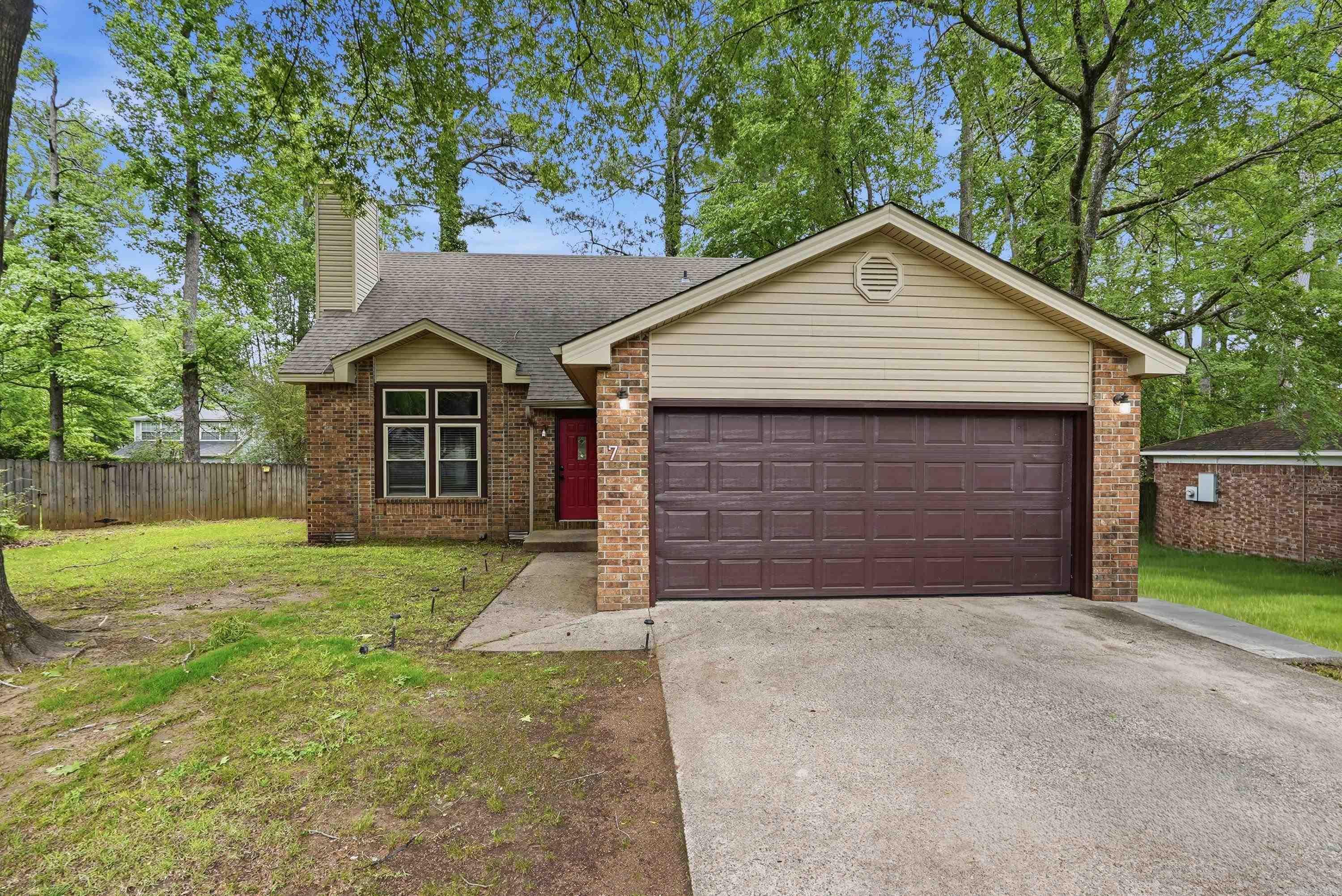This charming 4-bedroom, 2-bath home is perfectly situated on a quiet cul-de-sac.  The main level features durable luxury vinyl flooring, while the upstairs—home to three of the four bedrooms—offers cozy carpeting for added comfort. The thoughtful layout provides both functionality and privacy, making it ideal for families or guests.    Step outside to a fully fenced backyard with a spacious deck, perfect for entertaining, grilling, or simply enjoying your own private retreat.    Located in the sought-after Otter Creek area, residents enjoy access to fantastic amenities including a gated entrance, swimming pool, tennis courts, walking trails, and a welcoming neighborhood atmosphere. Plus, you’ll love the convenient access to I-430, I-30, I-630, and nearby shopping, including the outlet mall.    This home blends comfort, convenience, and community—ready for you to move in and enjoy!