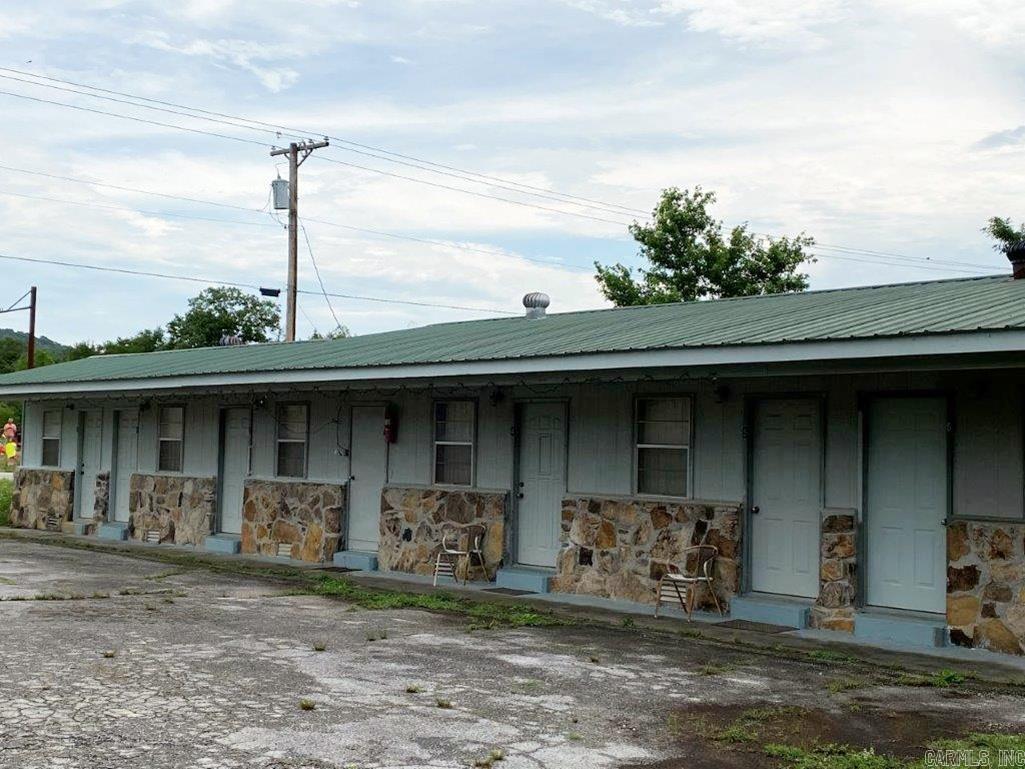 Home and income possibilities come with this house and 5-unit motel with opportunities for a beauty salon, office, etc. Total Square footage for Home/Salon/Motel is 3113 Sq. Ft. Two bedroom home could be converted to three bedrooms. Small shed for a workshop, storage, etc. Pretty park-like yard with room for your toys. Great location in small town on US Hwy 65 in the heart of the Buffalo National River country. Within 15-30 minutes of multiple landings on the river. Within an hour and 10 minutes of Bull Shoals, Table Rock, Taneycomo, Norfork and Greers Ferry Lakes, and the White and Little Red Rivers. Located within minutes of numerous camping, hiking, canoeing, hunting and sightseeing venues. Come check out this property offering a home and income stream opportunities! All #'s approximate. Acreage and age are estimates.