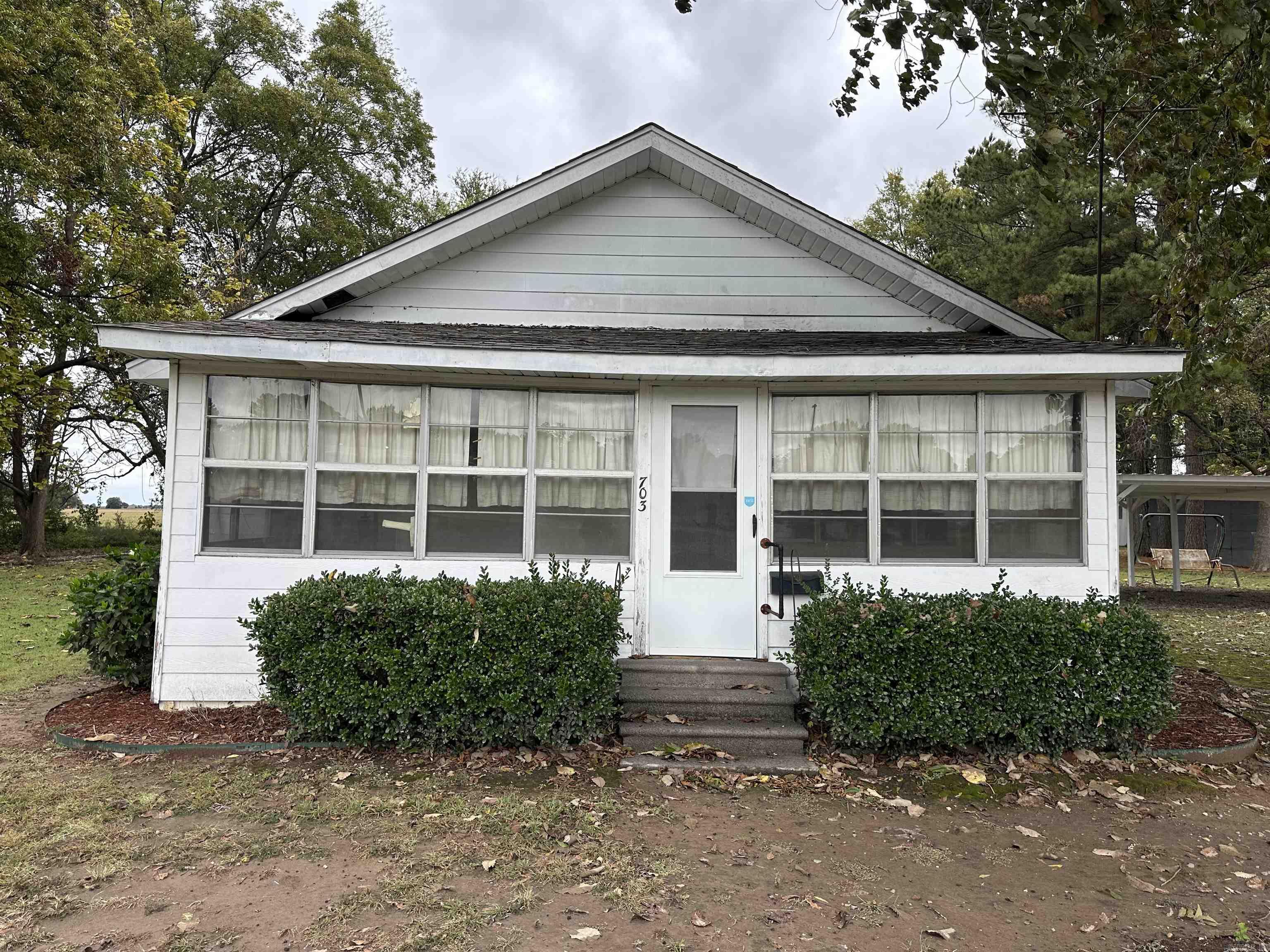 This cozy 2 bedroom, 1 bathroom home has great potential and sits on five generous lots.  Come and see this one owner home located in the heart of England!  This would be a great starter home or investment property.  Home is being sold As-Is and is priced to sell quickly!  Home is listed BELOW appraised value!