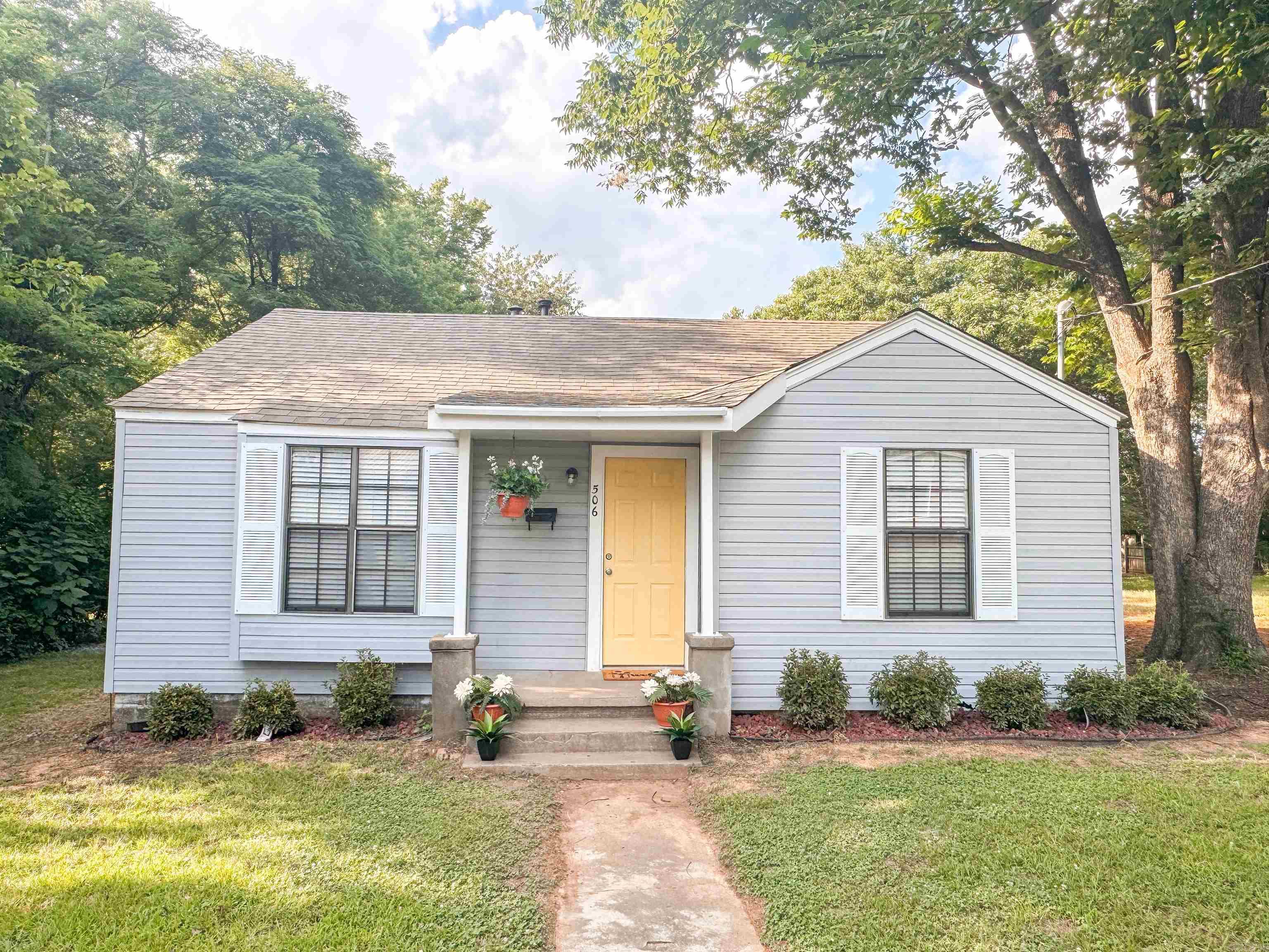 Cute little house that has been completely remodeled featuring brand new laminate floors throughout and new tile in the bathrooms, brand new paint & new bathroom fixtures. The kitchen has new cabinets, countertops and new appliances including a microwave and refrigerator. Other features include new light fixtures, separate laundry room, new back steps and a fenced backyard with a shed. The property goes beyond the fence.  Roof approx 10 years old, hvac approx 7 years old, & water heater is approx 6 years old. Nice and move-in ready! Call today for your showing!