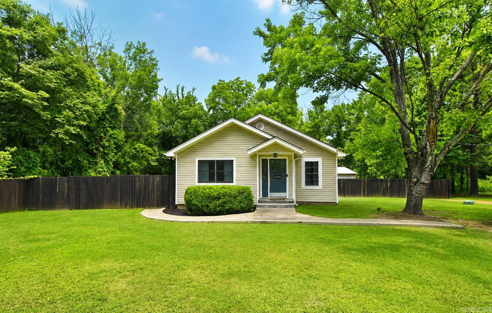 If you’ve been searching for a home with room to spread out, 47 Earl Drive deserves a look! Situated on approximately 0.60 acres, this property features a large, level, fully fenced backyard, spacious deck, and detached shop/garage—perfect for entertaining, pets, hobbies, or extra storage.   Inside, the home offers a functional kitchen with ample cabinet space and tile backsplash, along with a neutral interior ready for your personal touch.   Conveniently located near Conway amenities, this home also qualifies for USDA Rural Development financing, offering eligible buyers the opportunity for 100% financing with no down payment. Don’t miss the chance to own a property that offers the space and versatility buyers are looking for.