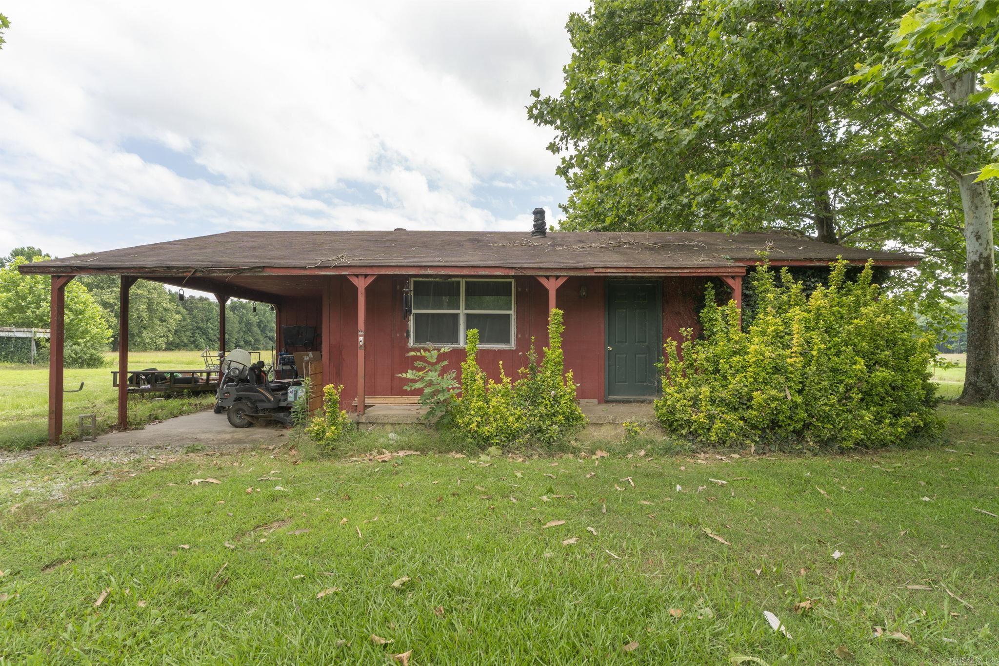 Country living with room to grow! Situated on 2 acres this rustic home offers a peaceful country setting surrounded by mature trees and open space. This charming fixer-upper needs your vision to make it shine! It has an additional 15.81 acres available with a scenic setting perfect for enjoying the outdoors offering the possibility for livestock, recreation, fishing in the stocked pond. New HVAC and HWH in 2021. The 15.81 acres is fertilized for hay production.  Sold AS IS  Home is being Sold As-Is. Acreage can be purchased separately or with together with the home with 2 acres. Adjoining 15.81 acre tract is listed separately MLS #26025049 Seller will consider offers on either property individually or as a package.