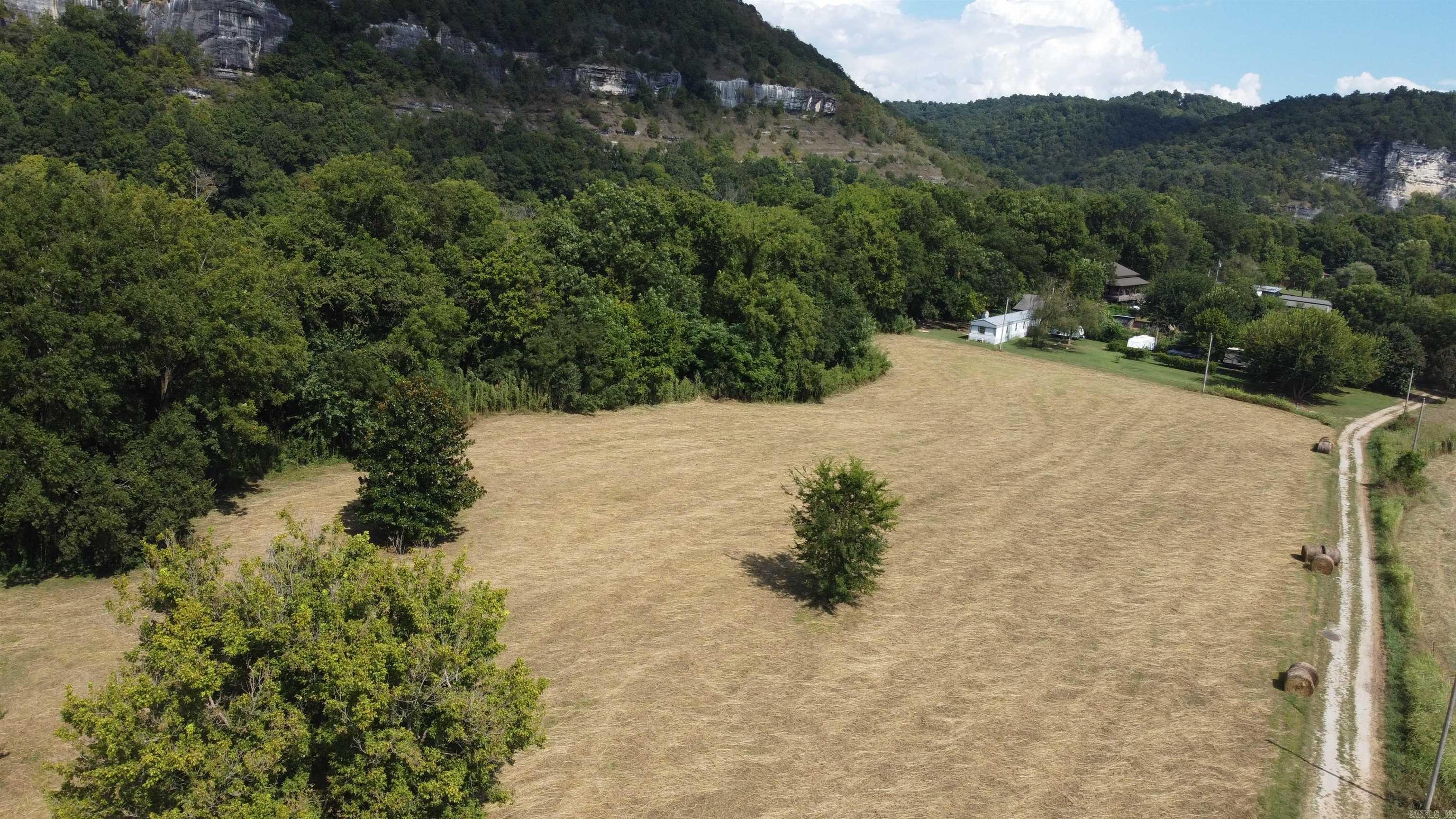 Looking for a getaway or a place to build your dream home, here is a great property with beautiful views of bluffs, mountains and the famous White River.  Walk down to the river and fish or very close to public access to launch your boat.  Take a look not many of this kind of location left.