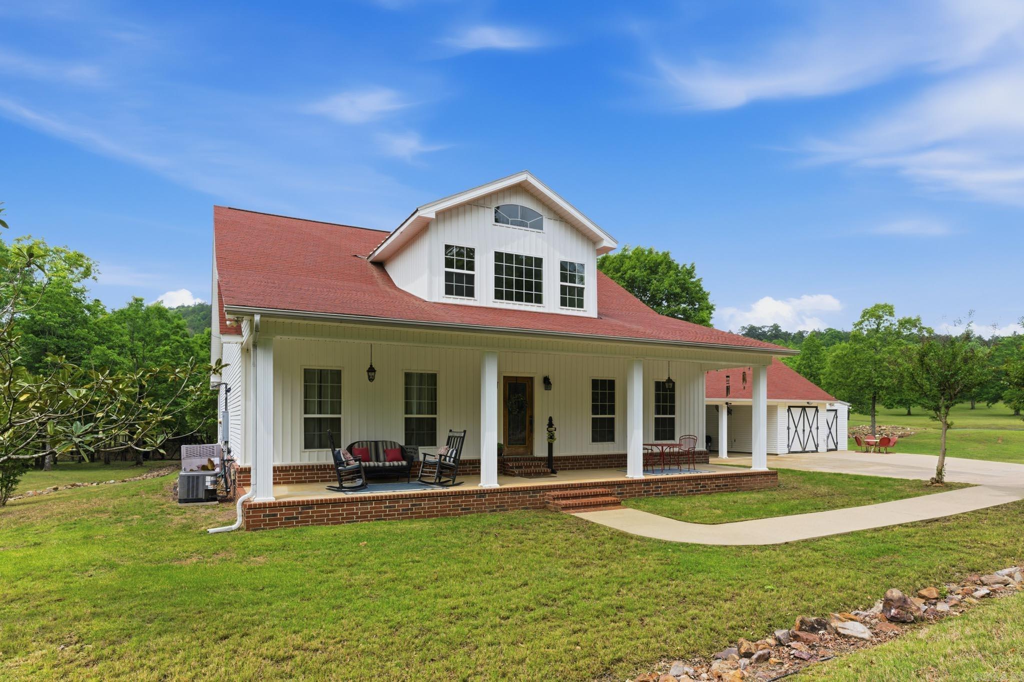 Tucked away at the end of a gated gravel driveway, this unique property offers privacy, space, and direct access to the outdoors. Situated on 15 beautifully cleared acres in Paron, Arkansas, the property backs directly to over 45,000 acres of the Ouachita National Forest with access right from your backyard. The home features over 3,000 square feet of living space, including a versatile loft area and enclosed sunroom perfect for enjoying the peaceful setting. Outside, you’ll find a private pond, shop, open storage shed, and garden house—offering plenty of room for equipment, hobbies, recreation, and more. Whether you’re looking for seclusion, outdoor adventure, or room to spread out, this is a rare opportunity to own a one-of-a-kind property with unmatched access to nature. *Agents See Remarks