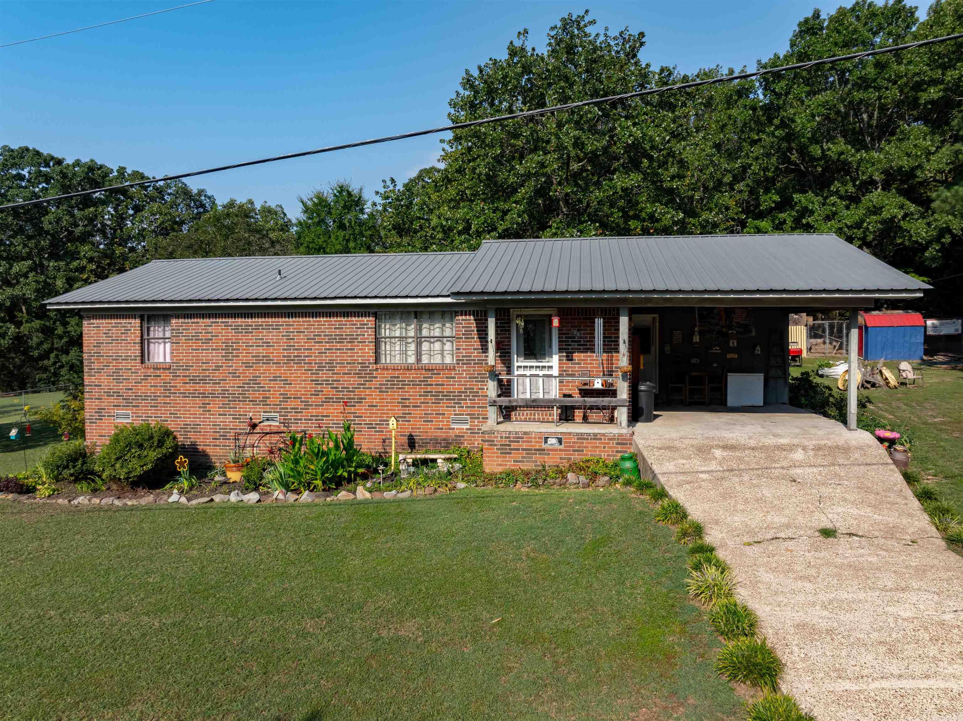 Comfort and easy living in the watermelon capitol!! This home offers 3 bedrooms and 1.5 baths in a quiet neighborhood. The wooded back parcel creates a very private feel.  Don't miss your chance to see this property.