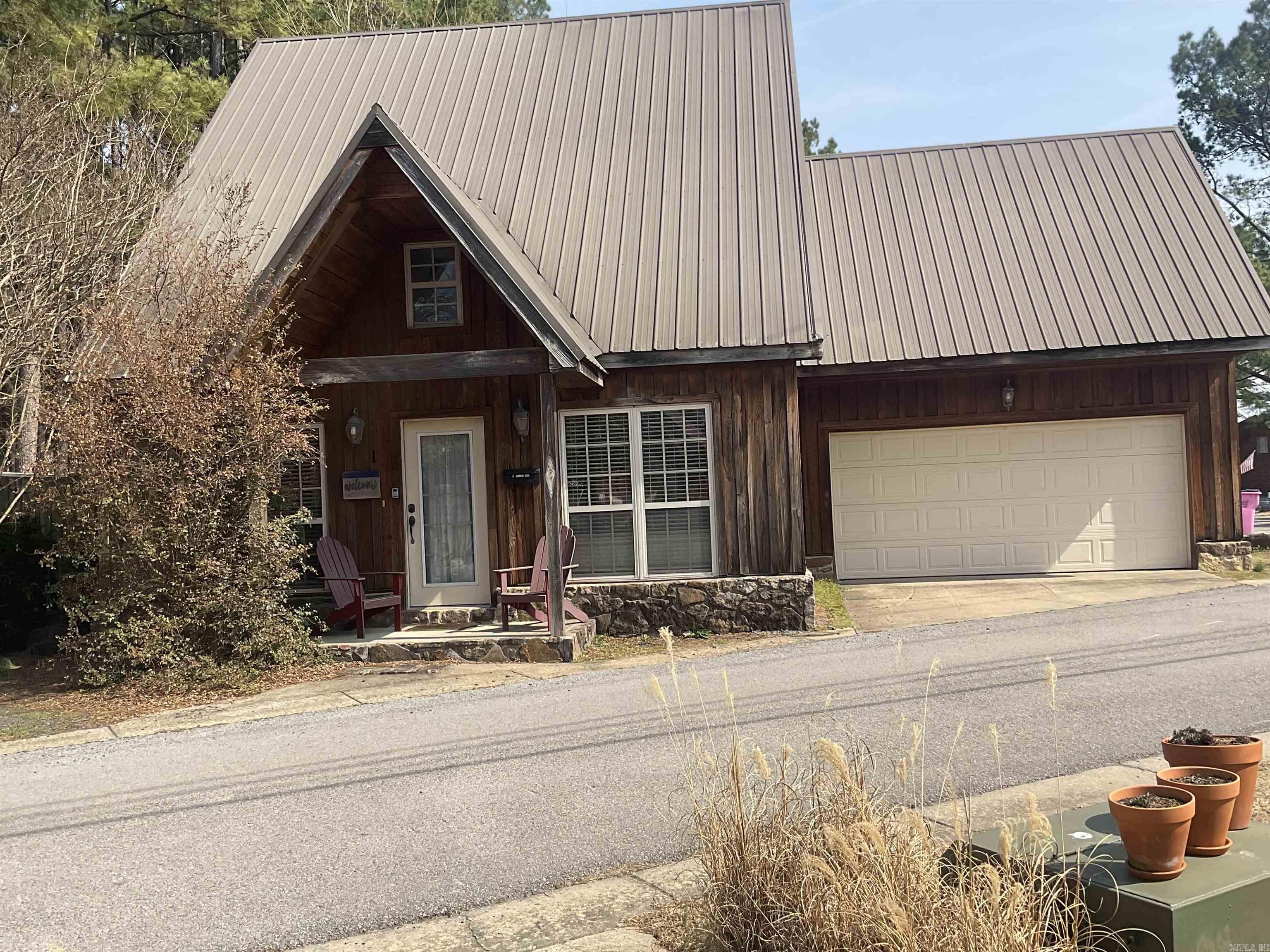 Welcome to your perfect getaway in the heart of Arkansas’ outdoor paradise! This spacious 3–4 bedroom cabin is located within walking distance of the renowned Little Red River, making it an ideal retreat for anglers, nature lovers, or anyone seeking peaceful cabin living. With generous living space, this property offers incredible flexibility—perfect as a full-time residence, vacation home, or income-producing investment property. Multiple sleeping areas provide room for family, guests, or rental potential. Conveniently situated just minutes from downtown Heber Springs, you’ll enjoy easy access to shopping, dining, and local charm. Outdoor recreation is truly at your doorstep—from world-class trout fishing on the Little Red River to boating and water sports on Greers Ferry Lake. Adventure awaits with a hike up Sugarloaf Mountain or exploring the many scenic trails throughout the area. Whether you're looking for a serene place to call home or a smart investment opportunity in a high-demand vacation market, this cabin offers space, location, and unlimited potential. Don’t miss your chance to own a slice of the Heber Springs lifestyle!