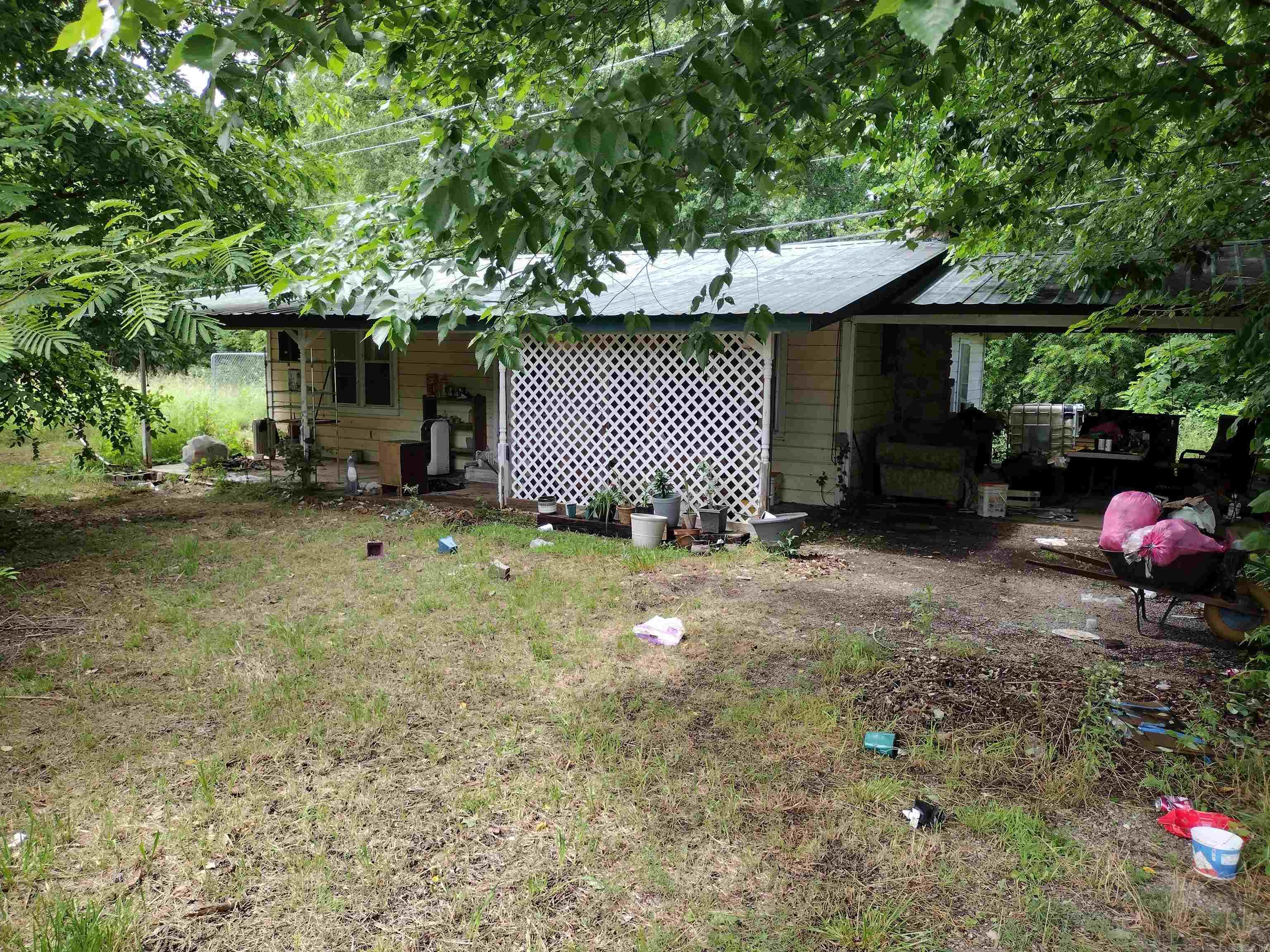 This Home needs some work and also a new septic system has shop that could be used for lots of things with Hwy frontage