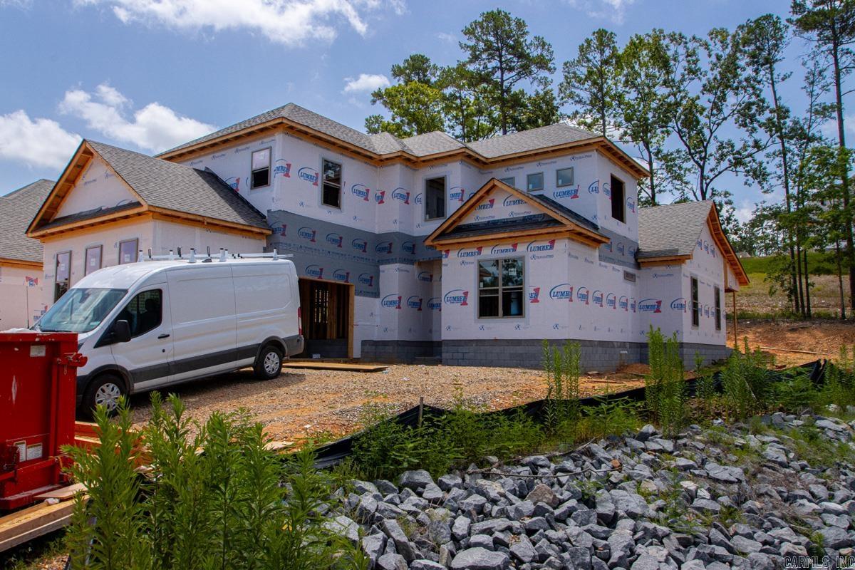 New construction in the exclusive Carter Creek Cove community. This sleek and modern home from HA Construction delivers 5 bedrooms, 4.5 baths, a 2-car garage and approximately 3,437 sq ft of thoughtfully designed living space. The statement brick exterior and crisp clean lines set the tone, while hardwood floors flow throughout the main level and seamlessly connect the living, dining and kitchen areas. The gourmet kitchen features stainless appliances, designer cabinetry and a large center island that opens to a stunning great room with abundant natural light and an inviting covered outdoor living space. Upstairs offers a flexible loft/media area ideal for guests, play or work. Situated on a premium lot with covered outdoor living, this home is under construction and now accepting contracts. Call or text today!