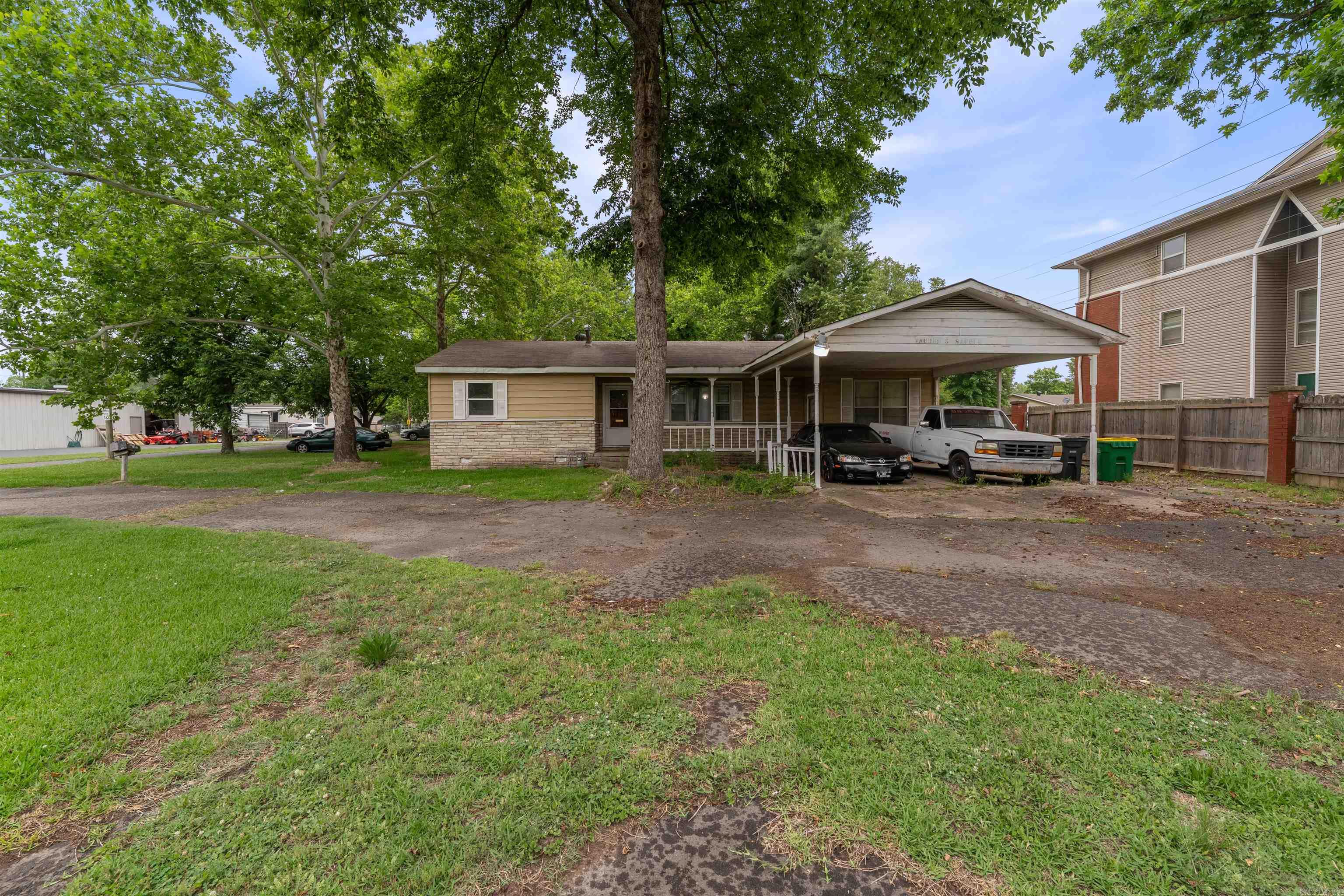 A unique investment opportunity on 1.63 acres with a property  offering two  living spaces. The one part is approx. 1300 sq. ft. with 2 bedrooms 1 bath a full kitchen, and covered porch with direct entry to a connected shop/storage area. The shop includes a storage area and a half bath adding versatility for hobbies, projects, or additional use. The second space  features  1 bedroom, 1 bath a kitchen, bedroom  and a laundry area, and is ideal as a guest suite, or multi-generational living unit. With ample yard space and 2 living areas, this property provides flexibility, privacy, and long term potential.  No seller property disclosure will not be provided. Storage building to convey at no value. Property to be sold as is.  Click on D on listing to see additional info. To be sold as is