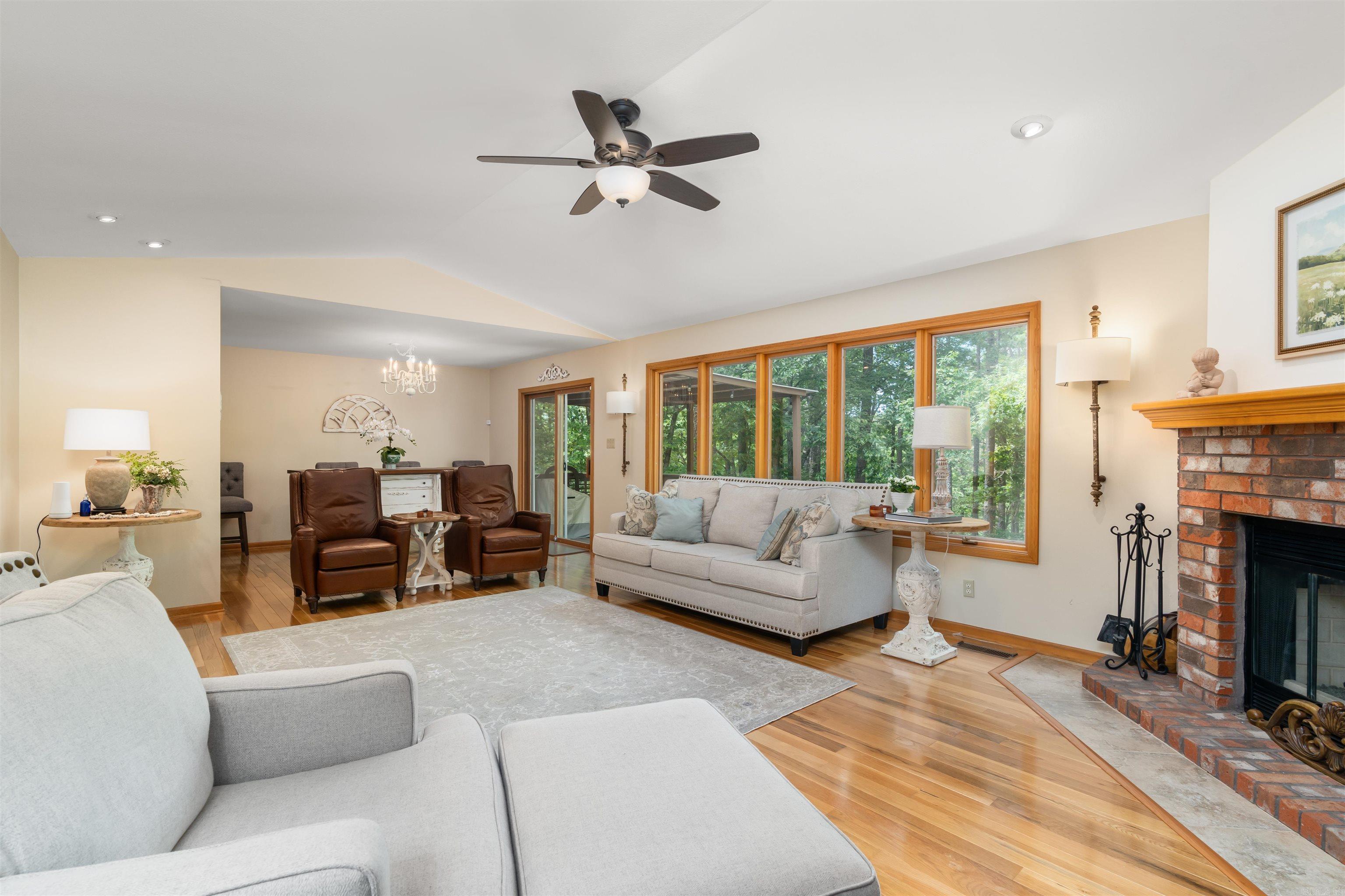 This beauty has 2 decks for all your entertaining needs! With a NEW roof in 2024, gas logs installed in 2025, new PEX lines in 2024, and a new stainless steel sink and faucet...this house is move in ready! The crawlspace is insulated and comes with the dehumidifier. Level driveway and low maintenance yard! Hardwoods floors in most of the house and newer carpet in 2 bedrooms. Gorgeous Roman shades in all the bedrooms and the dining room make this home inviting and cozy. Call today for your showing! AGENTS SEE REMARKS