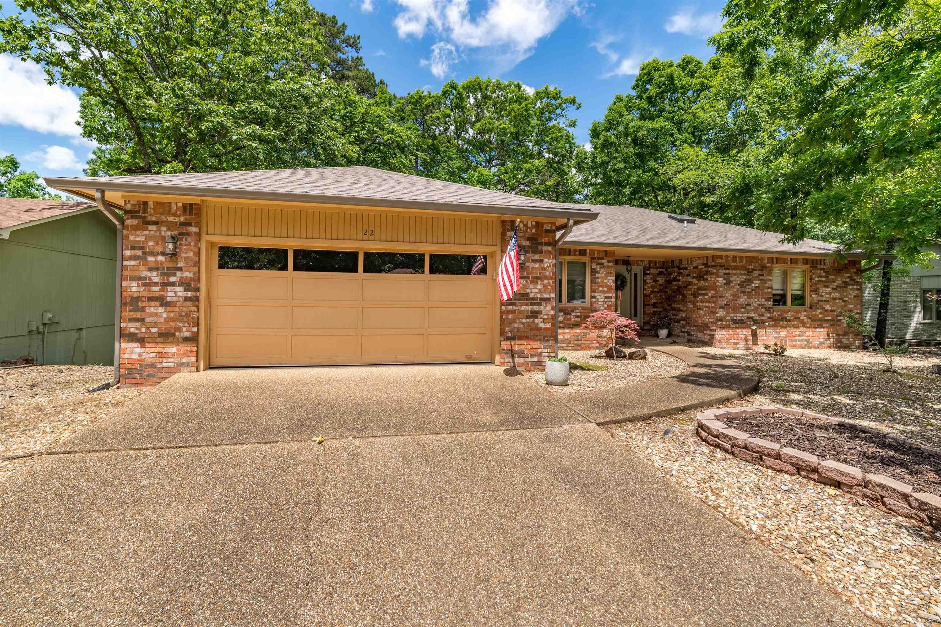 This beauty has 2 decks for all your entertaining needs! With a NEW roof in 2024, gas logs installed in 2025, new PEX lines in 2024, and a new stainless steel sink and faucet...this house is move in ready! The crawlspace is insulated and comes with the dehumidifier. Level driveway and low maintenance yard! Hardwoods floors in most of the house and newer carpet in 2 bedrooms. Gorgeous Roman shades in all the bedrooms and the dining room make this home inviting and cozy. Call today for your showing! AGENTS SEE REMARKS