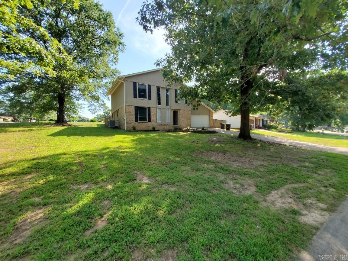 Cute house in the heart of Jacksonville! This generously sized 4-bedroom, 2.5-bath home offers plenty of space for comfortable living and entertaining. The large living room features a cozy fireplace and wet bar, creating the perfect spot for gathering with family and friends. Step outside to enjoy the fenced backyard and patio, ideal for relaxing, grilling, or outdoor entertaining. A garage provides convenient parking and storage, while the home is nestled in a quiet neighborhood with a central location close to everything Jacksonville has to offer. Don't miss your chance to make this charming property your new home!