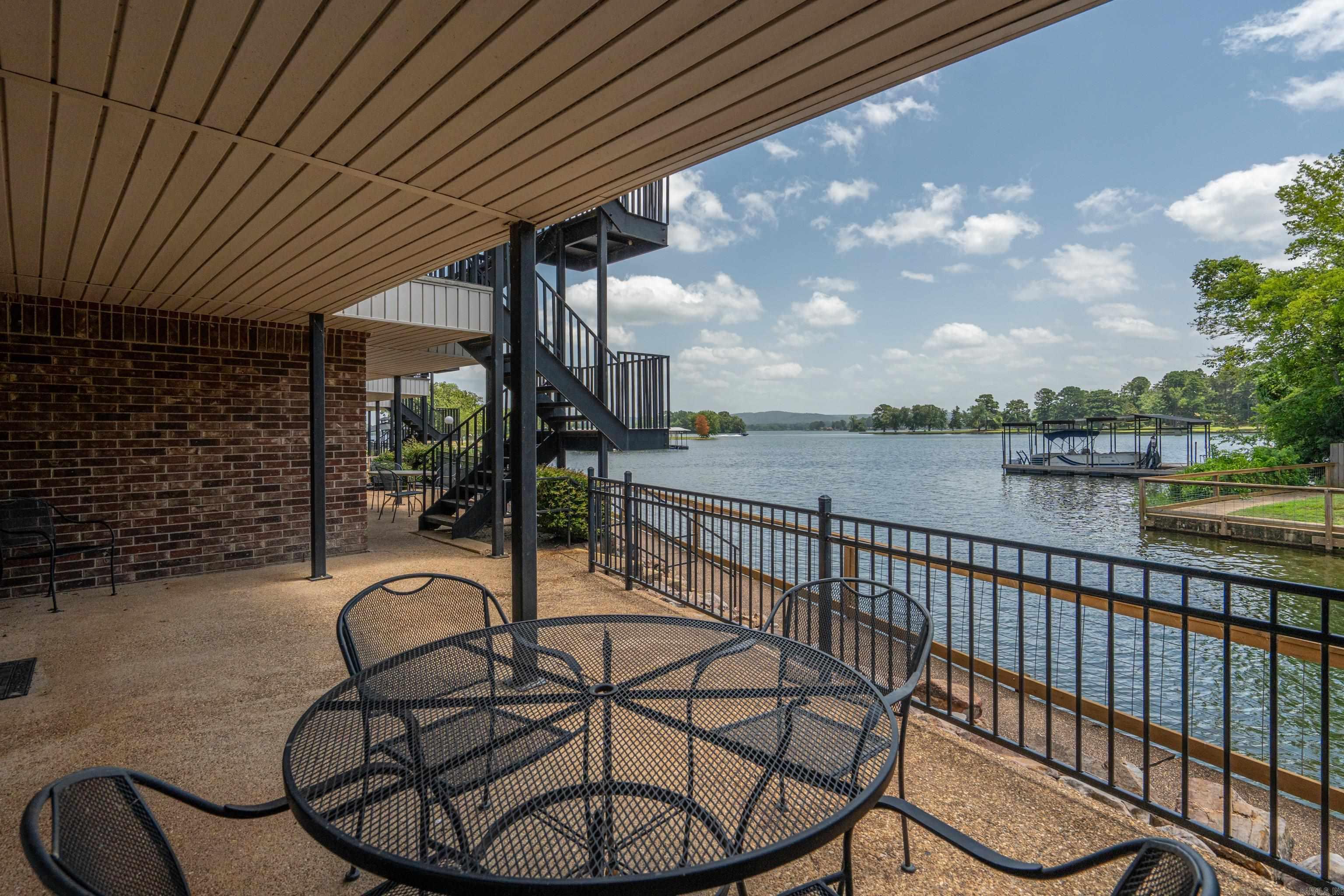 Welcome to Unit 5D in the Emerald Isle Subdivision! This well-maintained 2-bedroom, 2-bath condominium offers a comfortable and functional layout designed for easy living. The inviting living area features a fireplace that creates a warm focal point, while the adjoining patio provides a great space to enjoy fresh air or unwind outdoors. The thoughtfully designed floor plan offers spacious bedrooms and the convenience of two full bathrooms. Whether you're looking for a full-time residence, a weekend getaway, or a long-term investment, this condominium offers low-maintenance living in a desirable location. Per the subdivision's governing documents, short-term rentals are not permitted. Schedule your private showing today!