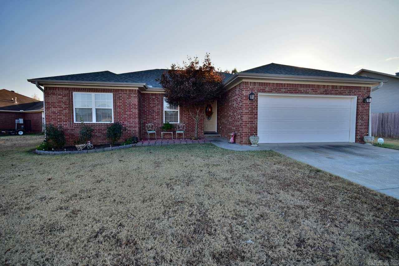 This beautiful 3 bedroom 2 bath home is nestled on a cozy lot with extra landscaping galore! The inviting entryway brings you in to the beautiful living room with gas fireplace. Eat in kitchen with upgraded appliances and refrigerator stays! Split floor plan featuring a large master with his and her closets and vanity. Guest rooms each have large closets. NEW ROOF in Spring of 2017. HVAC maintained regularly. The Rose Garden in the back yard with covered back porch is a paradise right at home! Call today!