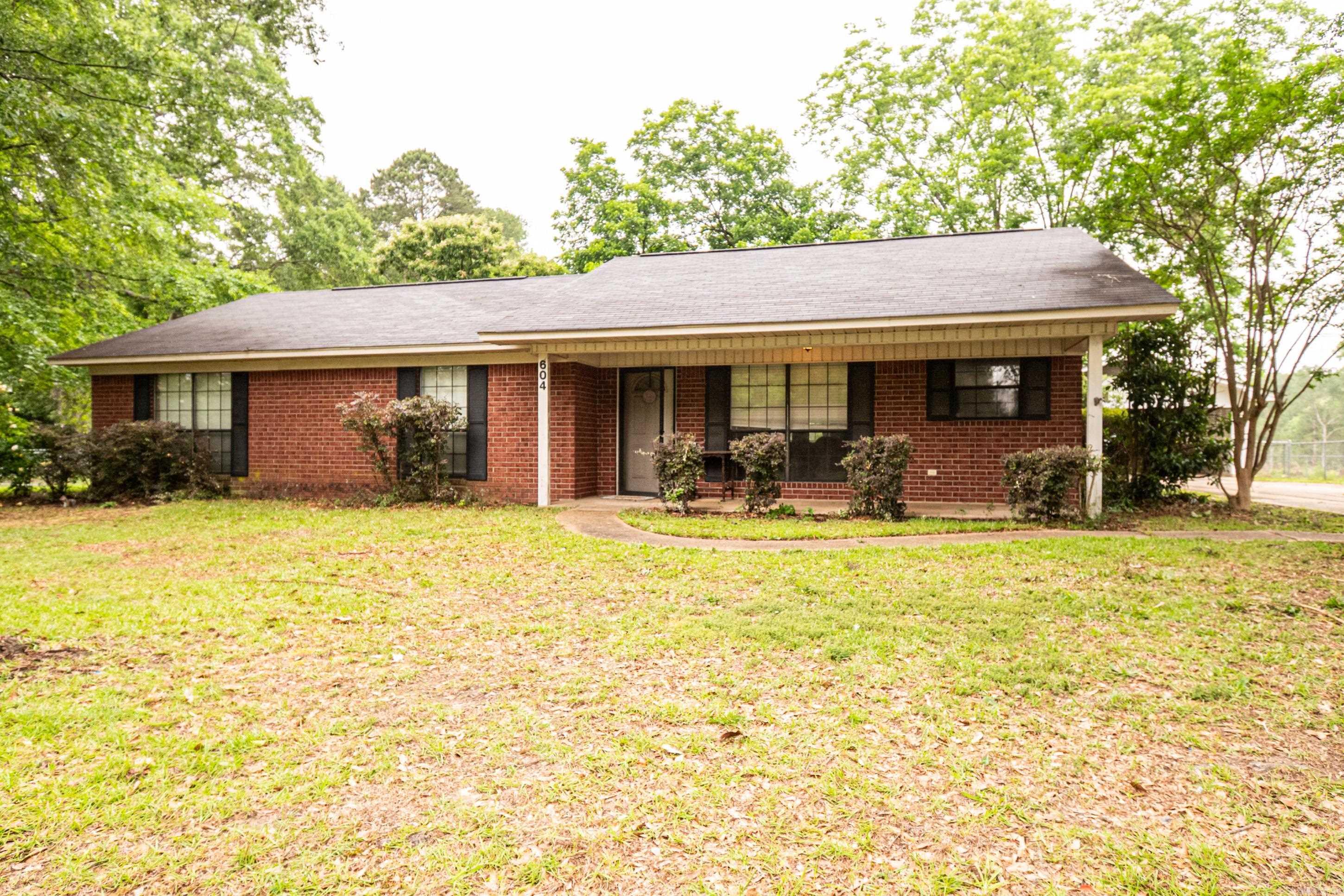 Welcome to 604 W. University! Conveniently located just minutes from Southern Arkansas University, this charming 3-bedroom, 2-bath home offers comfort, convenience, and incredible value. Situated on two lots, the property features a fully fenced yard with plenty of space for outdoor entertaining, pets, or future possibilities.  This move-in-ready home is being sold fully furnished, making it ideal for a primary residence, college housing investment, or turnkey rental opportunity. All kitchen appliances, along with the washer and dryer, are included in the sale.  Don’t miss this rare opportunity to own a fully furnished property in a prime location close to SAU, shopping, dining, and more!