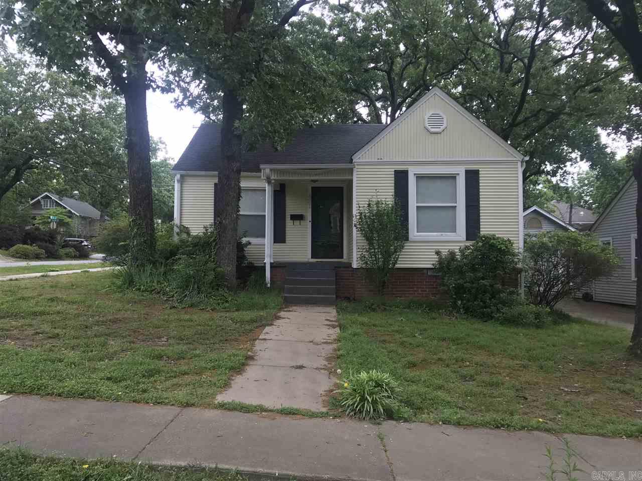 Great two or three bedroom one bath home with all appliances included. Ready for immediate move in. Fenced in yard and on a corner lot. Nice little carport to park under. Upstairs is an extra room with two closets and built in storage drawers that could be an extra bedroom or bonus room. Home offers an eat in kitchen and a separate dining area.