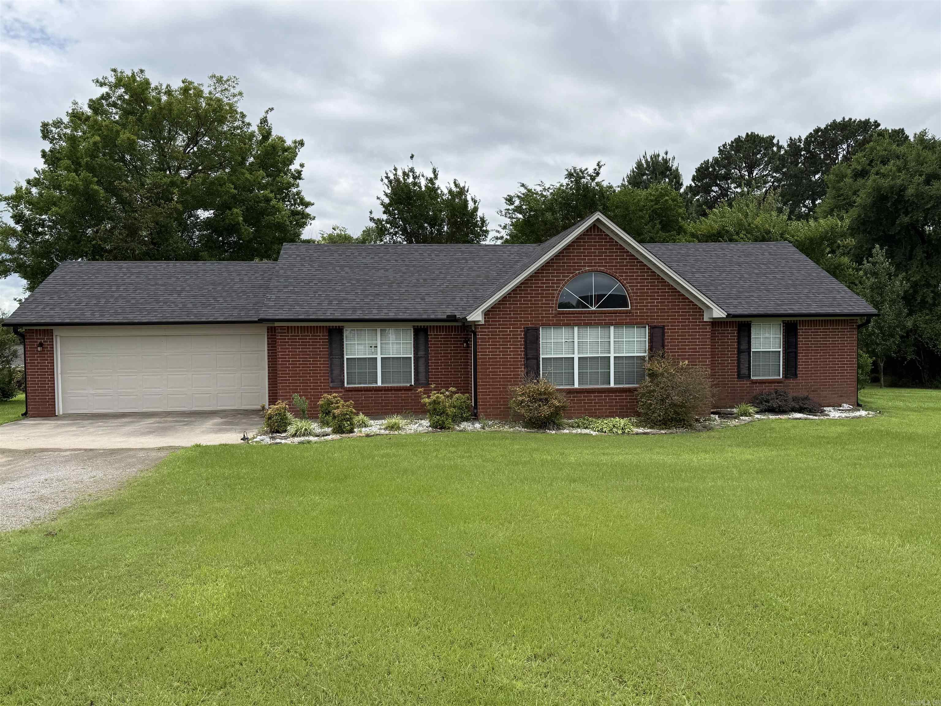 Stunning brick home loaded with updates! This beautifully refreshed 3-bedroom, 2-bath home offers 1,536 square feet of comfortable living space, all situated on a spacious and scenic 1-acre lot.  Recent upgrades include a brand-new roof, new vinyl siding, new gutters, and updated flooring throughout—giving the home a fresh, modern feel while maintaining its classic charm.  Enjoy the best of both worlds with a peaceful country atmosphere, all while being just minutes from town and everyday conveniences.  Don’t miss out on this move-in-ready gem—schedule your showing today!