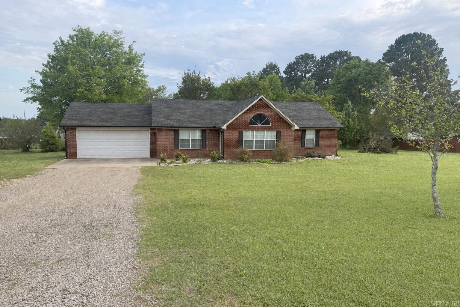 Stunning brick home loaded with updates! This beautifully refreshed 3-bedroom, 2-bath home offers 1,536 square feet of comfortable living space, all situated on a spacious and scenic 1-acre lot.  Recent upgrades include a brand-new roof, new vinyl siding, new gutters, and updated flooring throughout—giving the home a fresh, modern feel while maintaining its classic charm.  Enjoy the best of both worlds with a peaceful country atmosphere, all while being just minutes from town and everyday conveniences.  Don’t miss out on this move-in-ready gem—schedule your showing today!