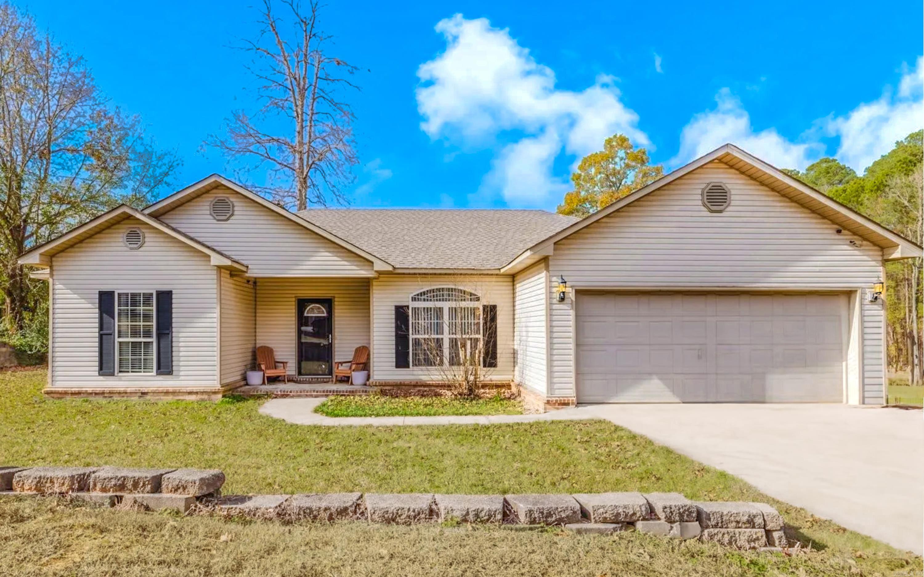 This amazing home is just waiting for YOU!!!!  This adorable 4 bedroom 2 bath home is on a corner lot and is sitting on 0.65 acres.  You will love all the space that this home has to offer.  Large living room with a 4 TV setup that will convey with the property.  There is also a bonus or office space as well off the garage.  You will love being within walking distance between 3 Sheridan schools.  You will enjoy the NEW FLOORING (2025) throughout the home, as well as NEW HVAC 2024 and NEW ROOF with architectural shingles and NEW HOT WATER HEATER BOTH IN 2021.   You will enjoy your large outdoor space to create whatever you wish on this little over half acre.  You don't want to miss this amazing property!!!  Call me or your agent to schedule your showing and lets make this your next home where you can make amazing memories with your loved ones!!  QUALIFIES FOR RURAL DEVELOPMENT LOAN!!!!