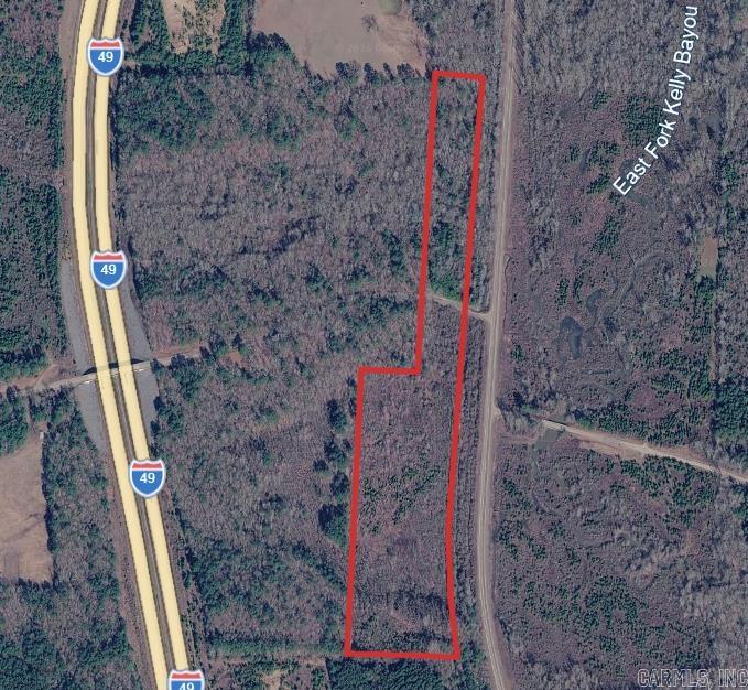 20± acres located just south of Doddridge, Arkansas, offering an excellent hunting and recreational opportunity. The property borders the East Fork of Kelly Bayou, providing natural wildlife habitat and a secluded outdoor setting. Mixture of wooded terrain with areas lying within a designated flood zone. Conveniently located just off Highway 71 with quick access to Interstate 49, making it easy to reach while still feeling tucked away. Ideal for hunting, recreation, or a weekend getaway.