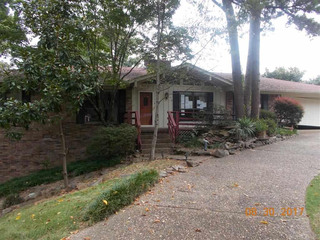 Property being sold as-is with no representations or warranties.  Pre-qual letter or proof of funds required with all offers.  Great location with view of the river!  Spacious 5 bedroom 5 bath home with 3 living areas, 2 dining areas, office, small workshop space, expansive decks on both upper and lower levels.  Hardwood floors in living and dining areas and master.  Agents see confidential remarks for showing instructions and additional information.